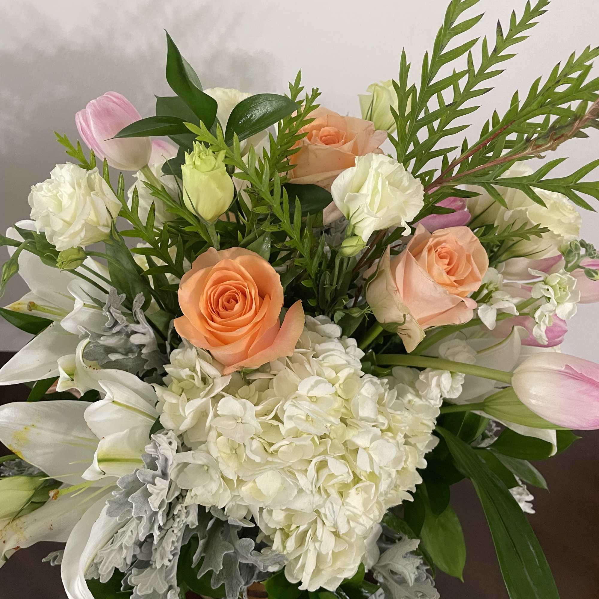A large pastel-colored basket suitable for sending to the home after the