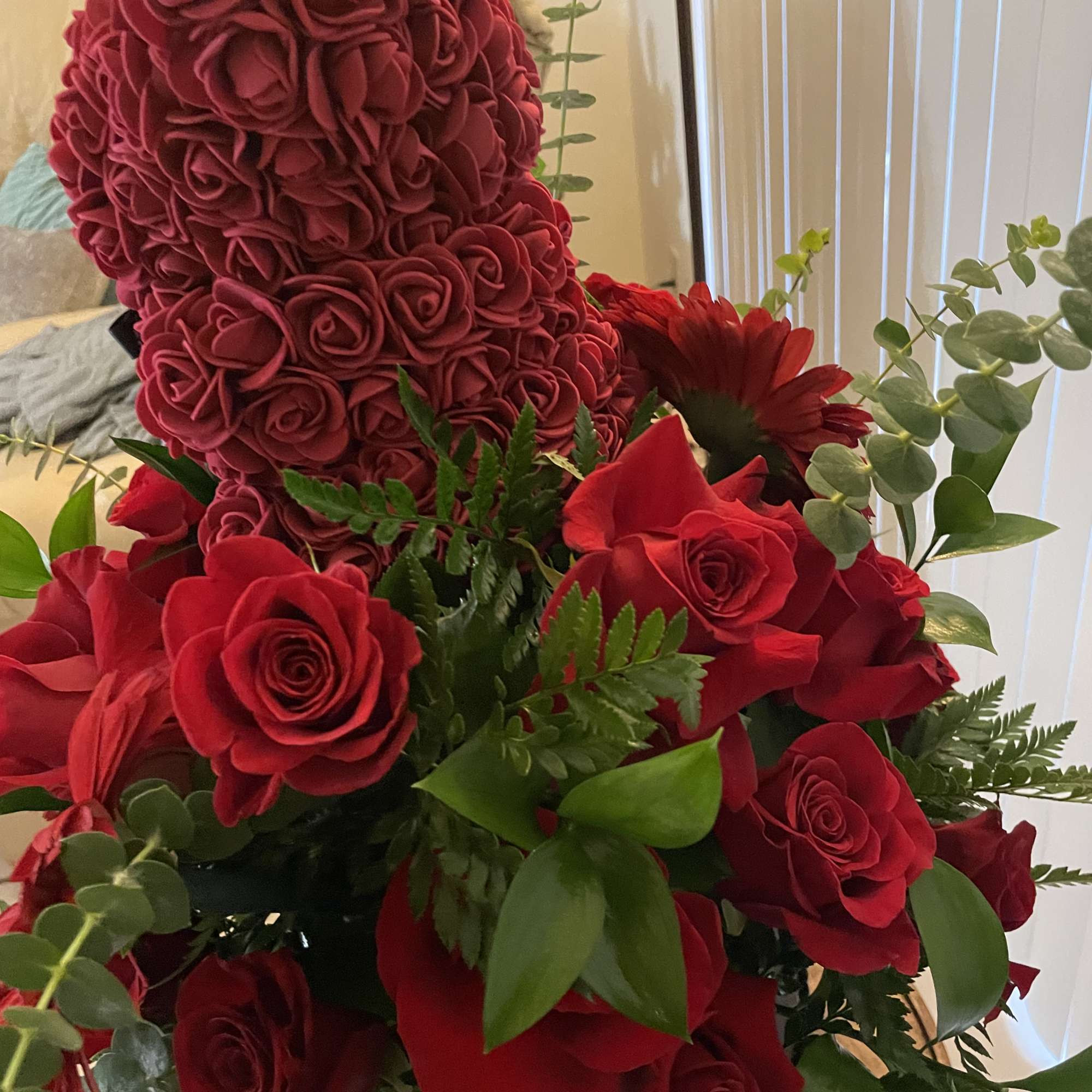 Red rose bouquet with a heart-shaped rose topiary and greenery