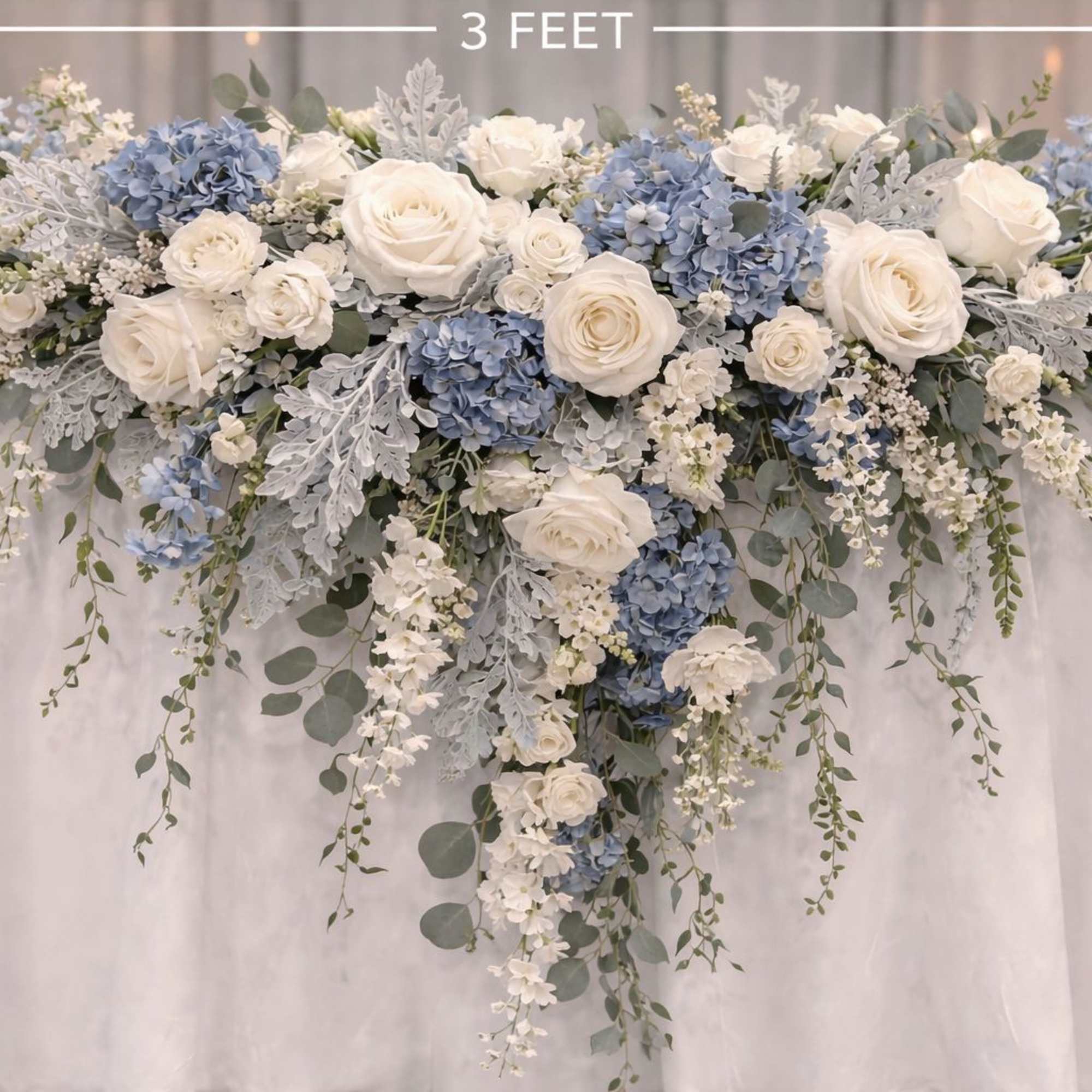 White and blue floral garland draped over a table