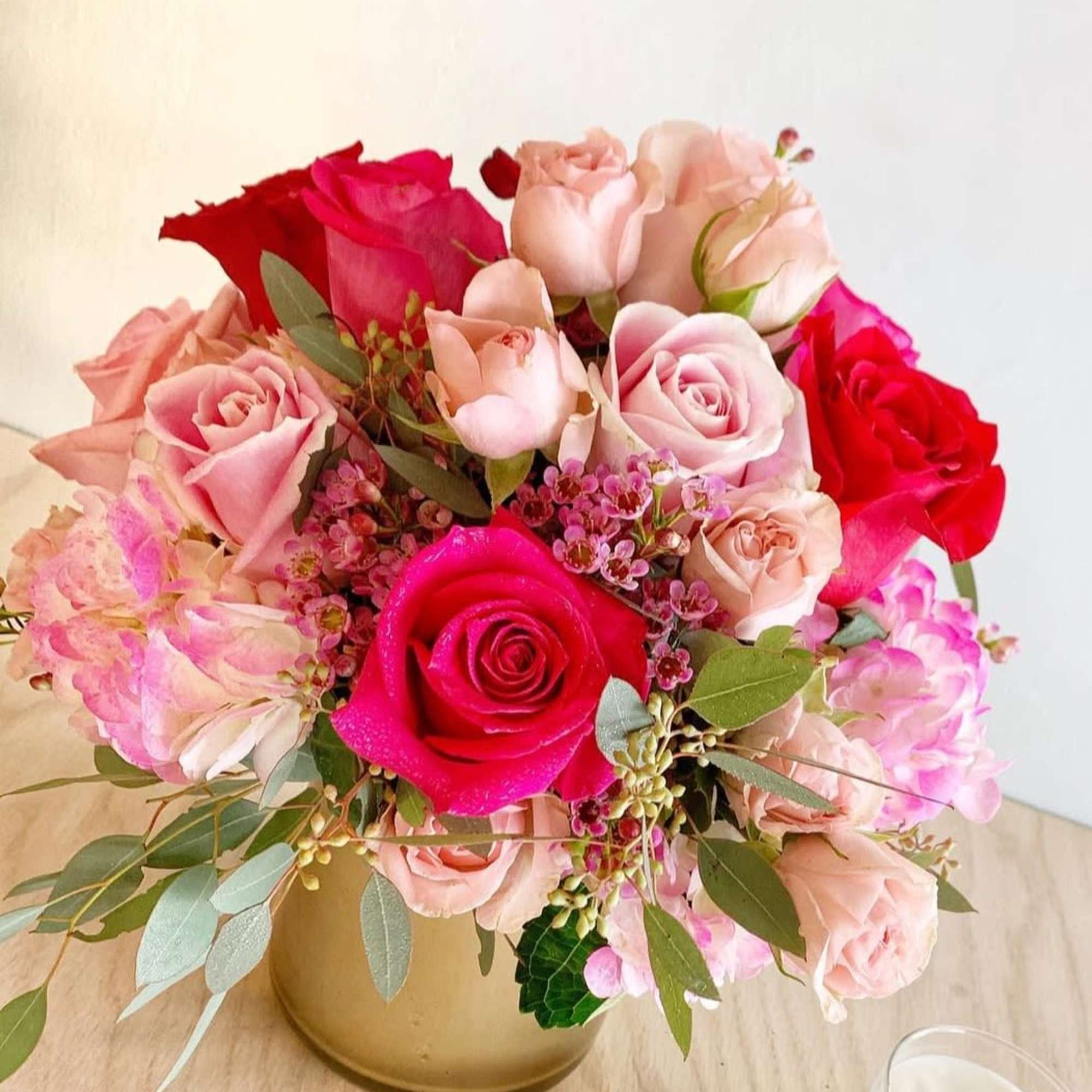Sweet in Pink is a delicate and charming floral arrangement designed in