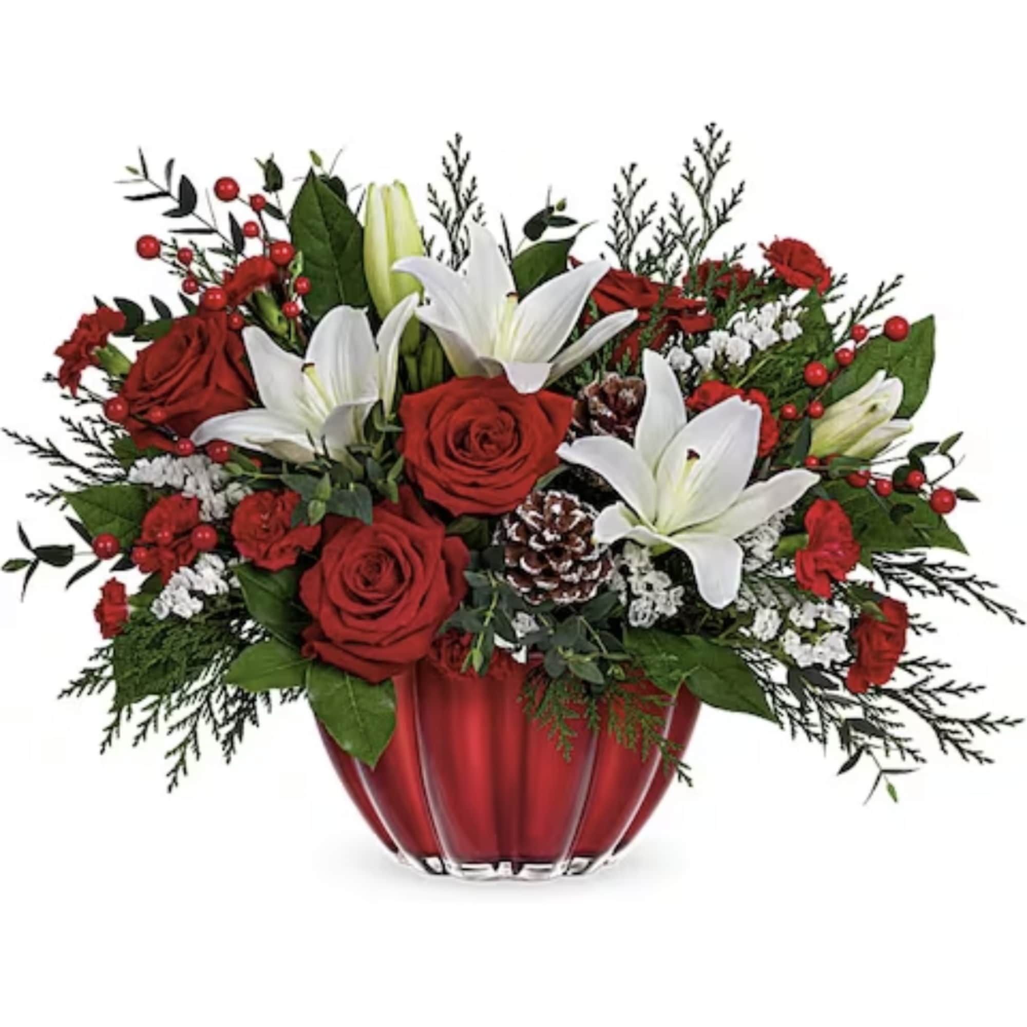 Red roses and white lilies arranged in a red glass vase
