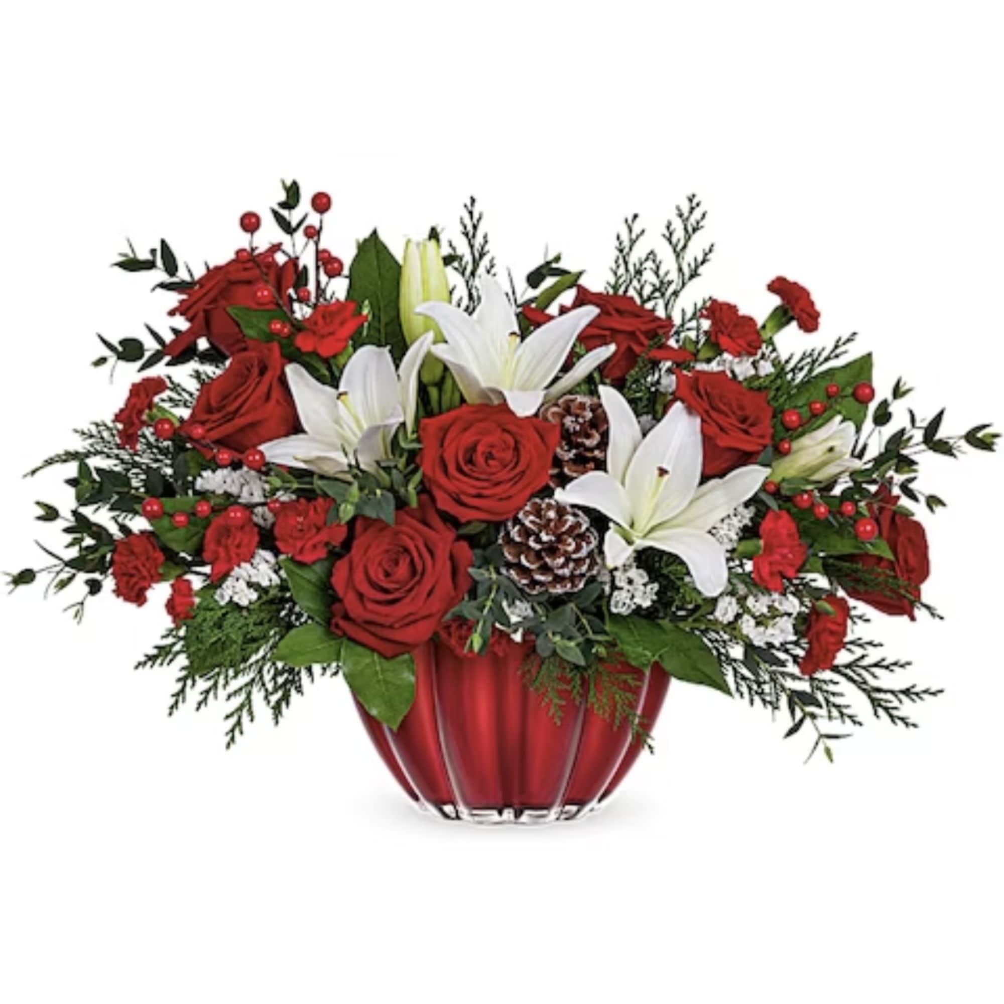 Red roses and white lilies in a red glass vase