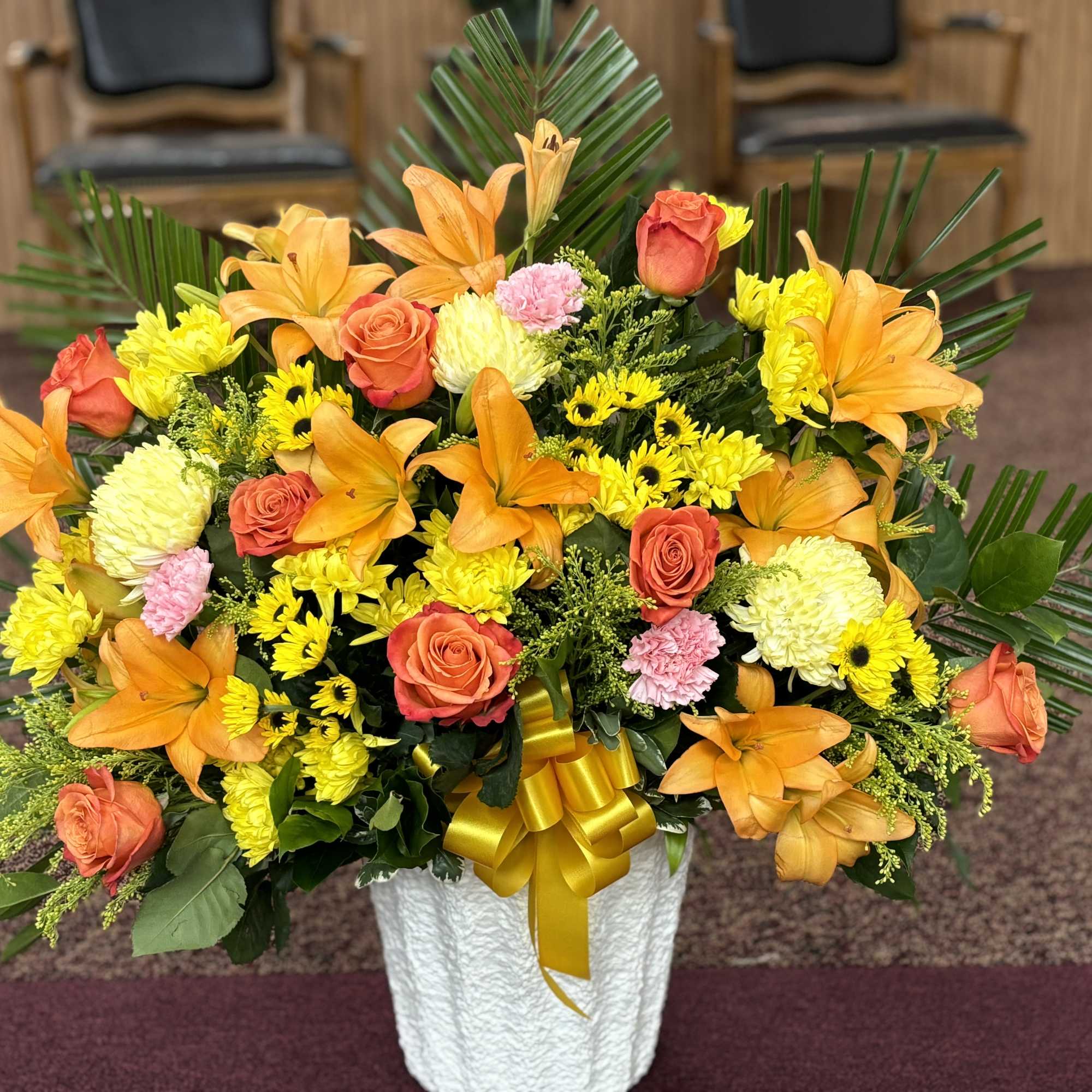 Statice Purple		STEM	3
Solidago		STEM	11
Viking Pom Yellow		STEM	8
Spider Mum Yellow, Leather Leaf,	Asiatic Lily Orange, Carnation Hot, photo 2 of 3