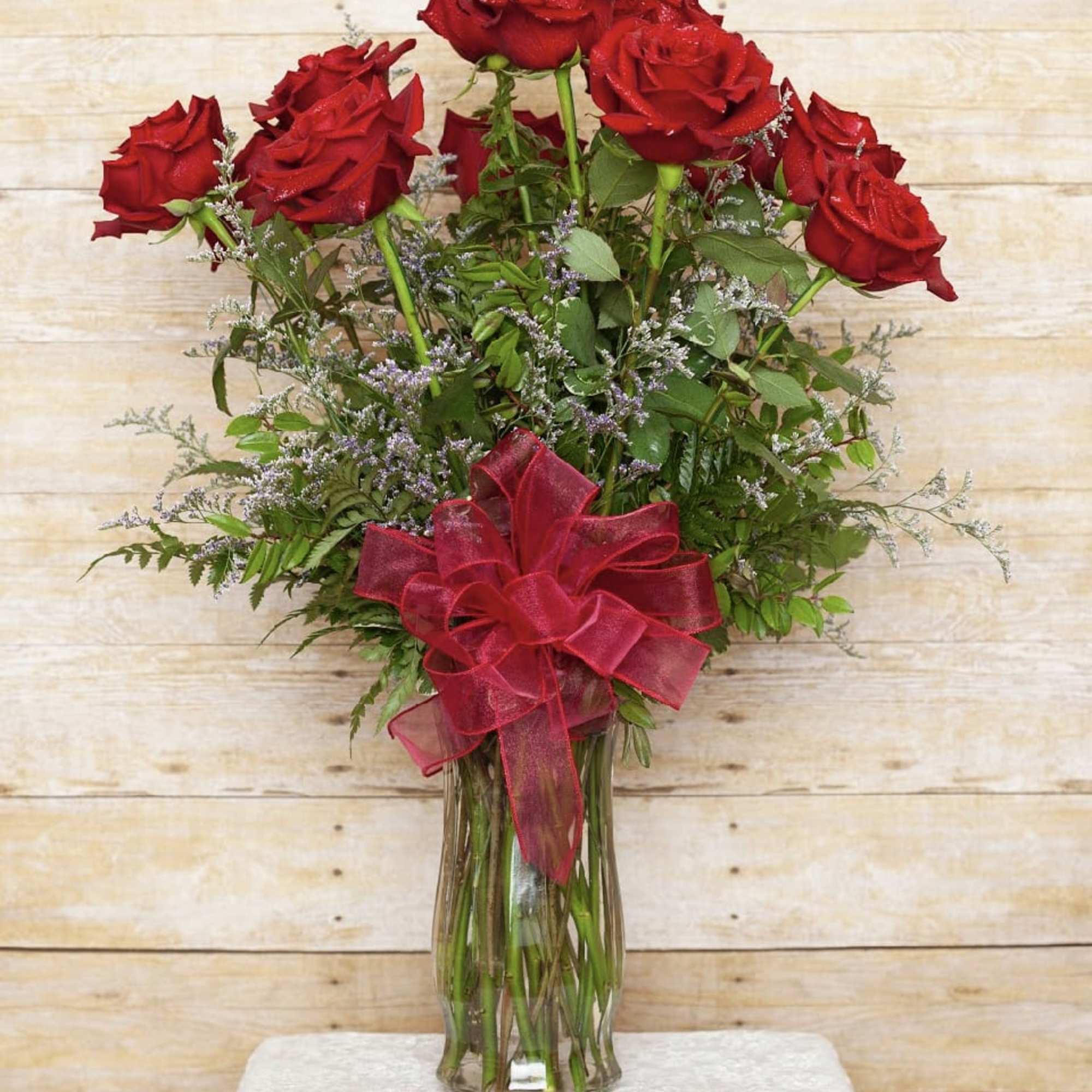 These dozen red roses are the classic romantic gift! Perfect for the