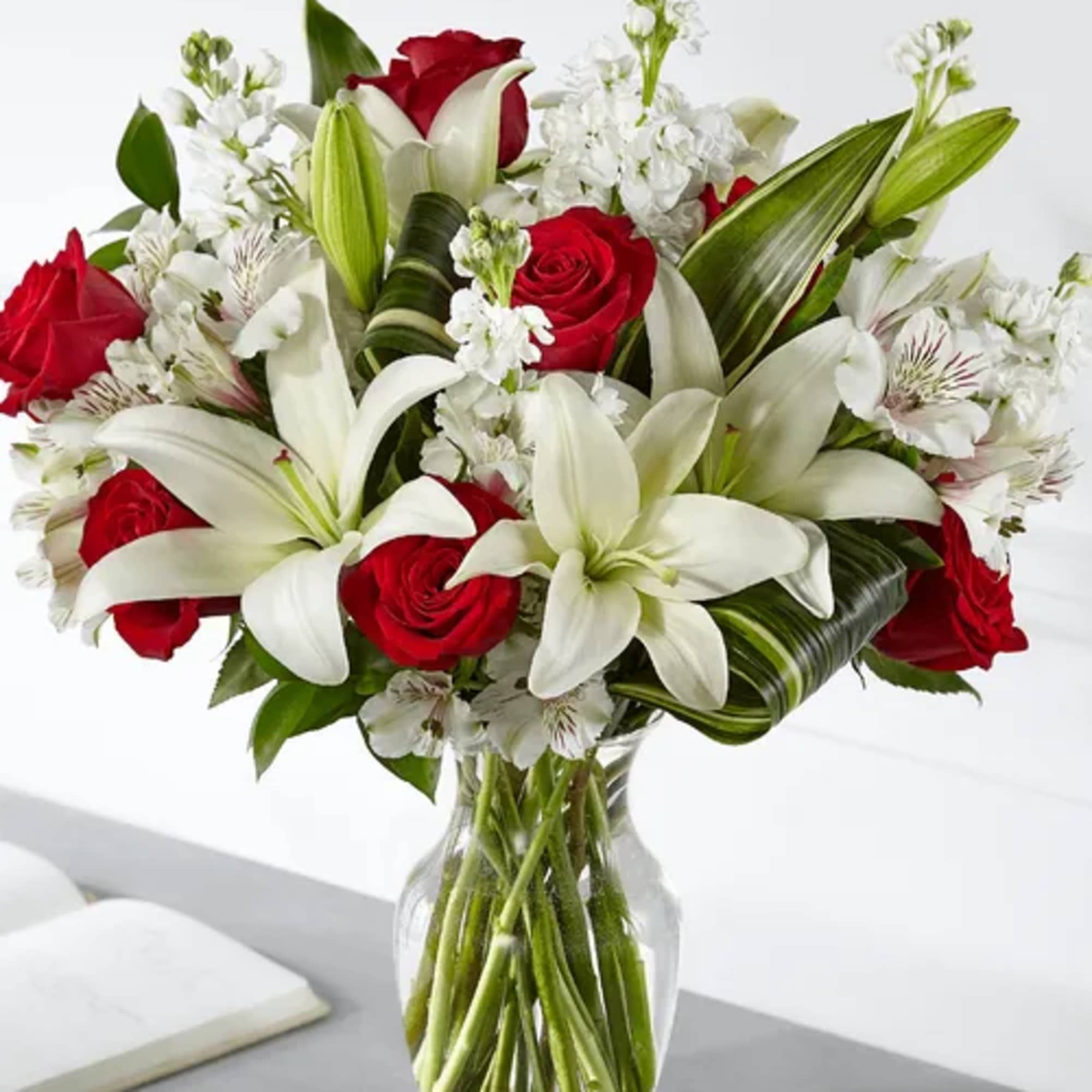 Standard bouquet is approximately 19"H x 15"W. DELUXE bouquet is approximately 19"H