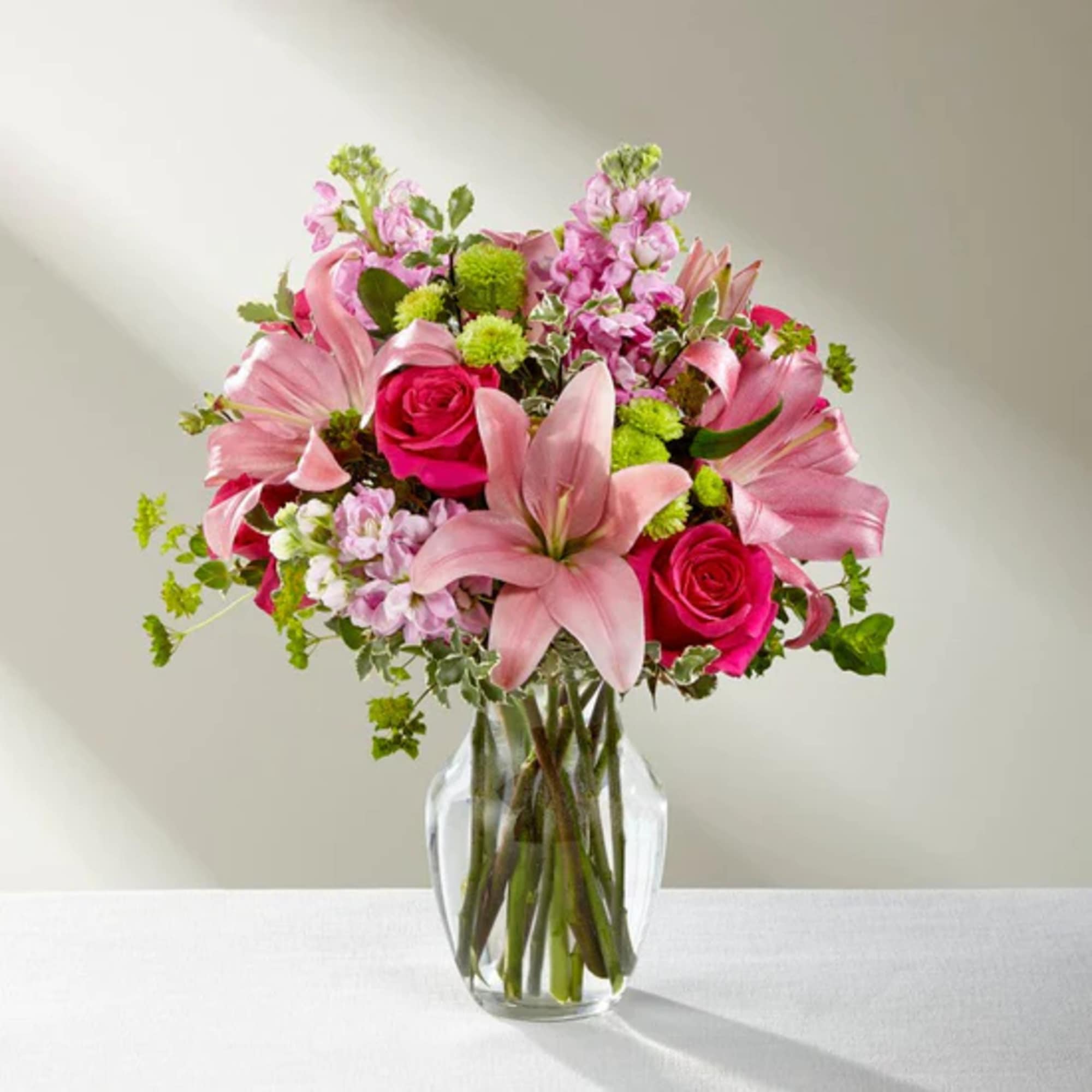 The Pink Posh Bouquet is chic and pink to help you celebrate