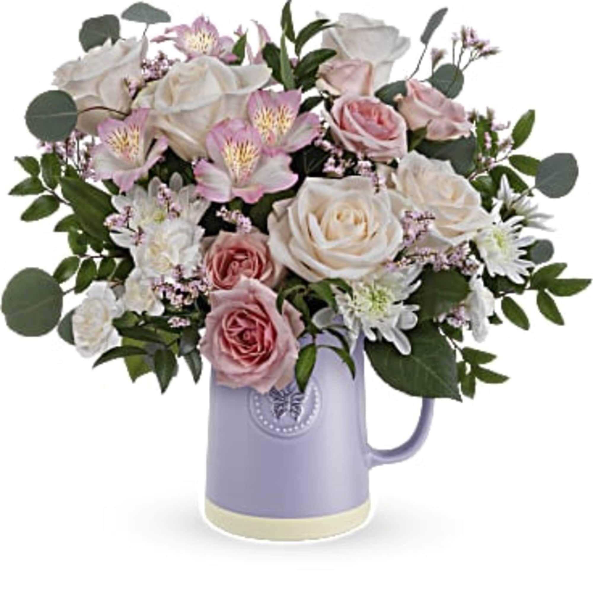 Gift Mom timeless elegance with our Teleflora's Sweetest Flutter pitcher. This food-safe