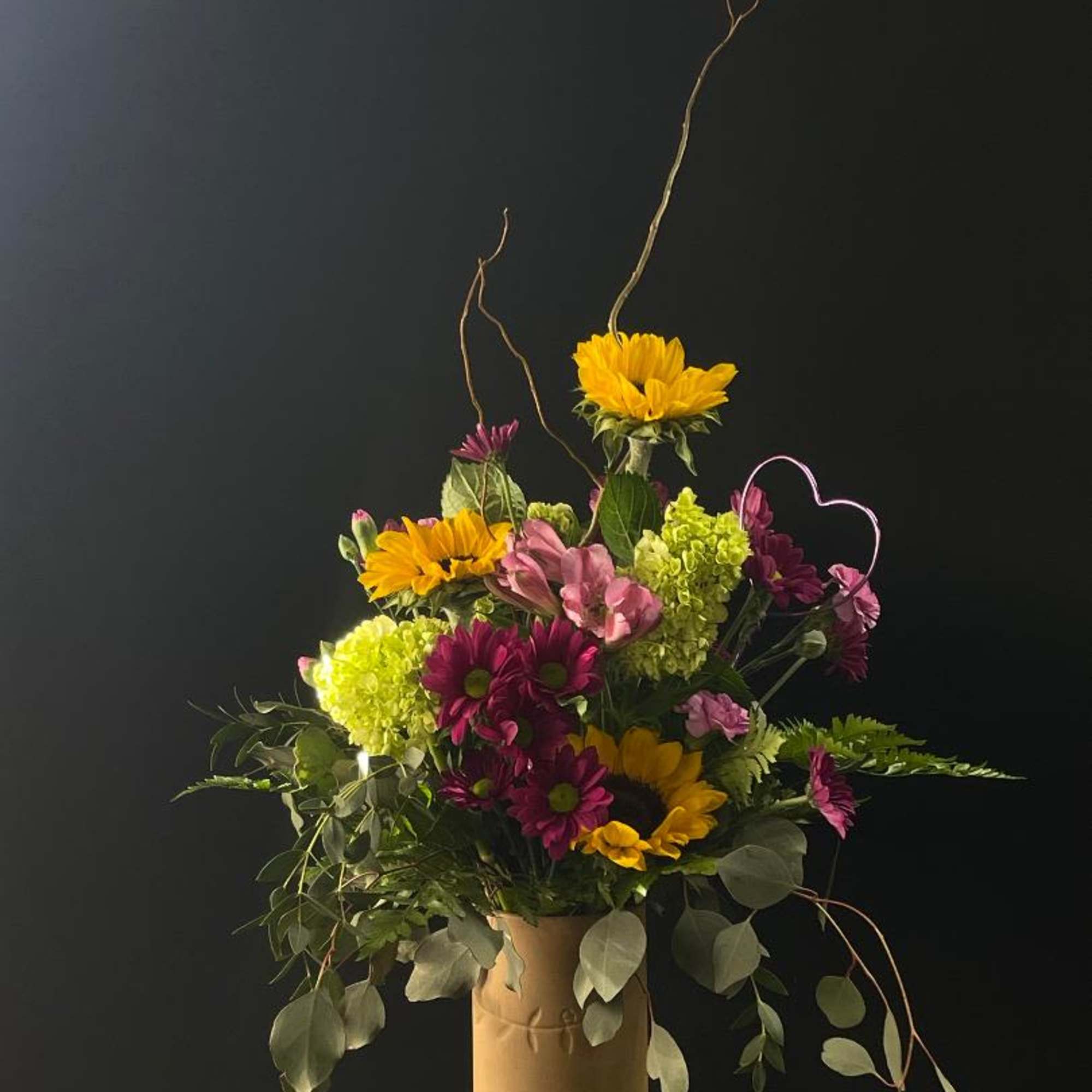 Beautiful, rustic vase with glossy red on the inside.
