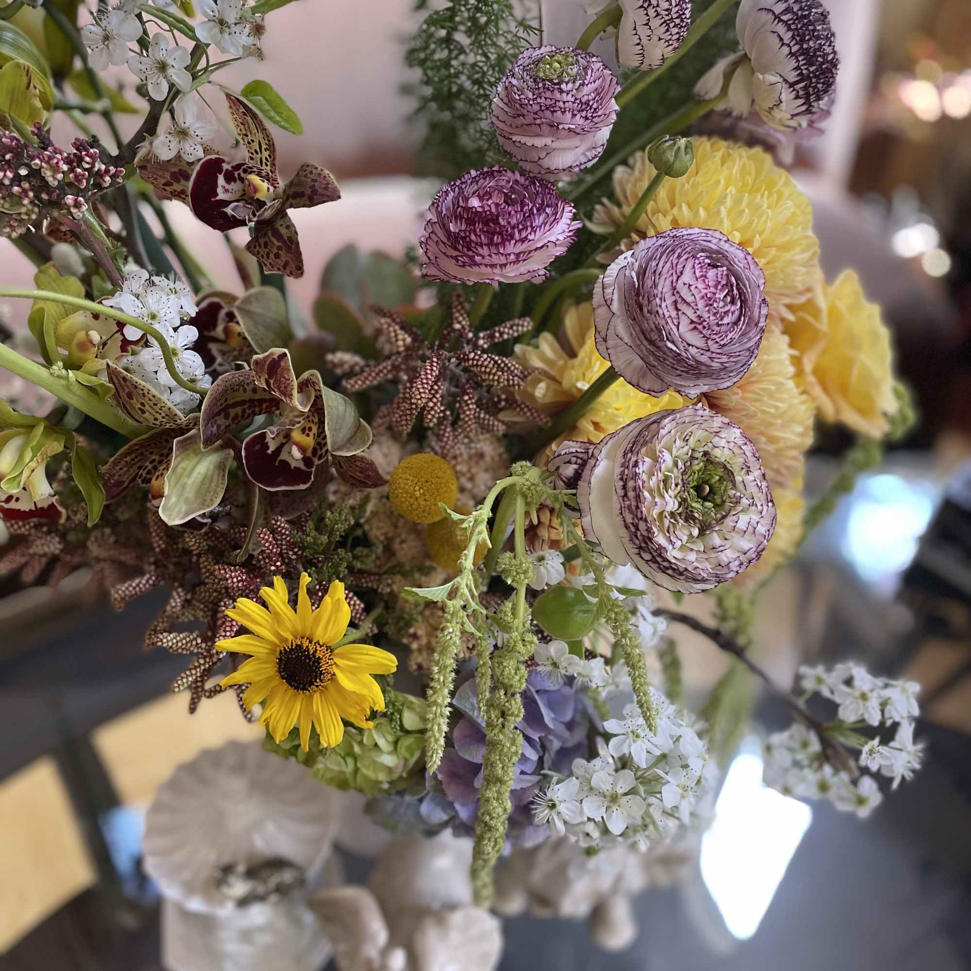 Mixed bouquet with purple, yellow, and white flowers
