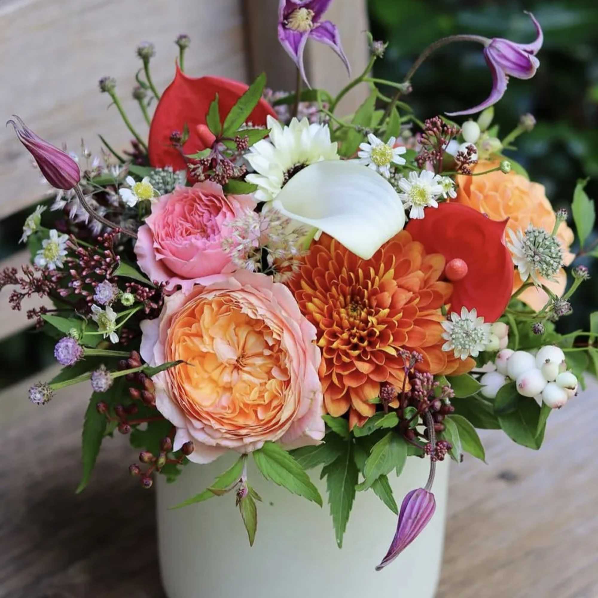 Elevate your cocktail celebration with our exquisite "Seasonal Splendor" floral arrangements, where, photo 3 of 5
