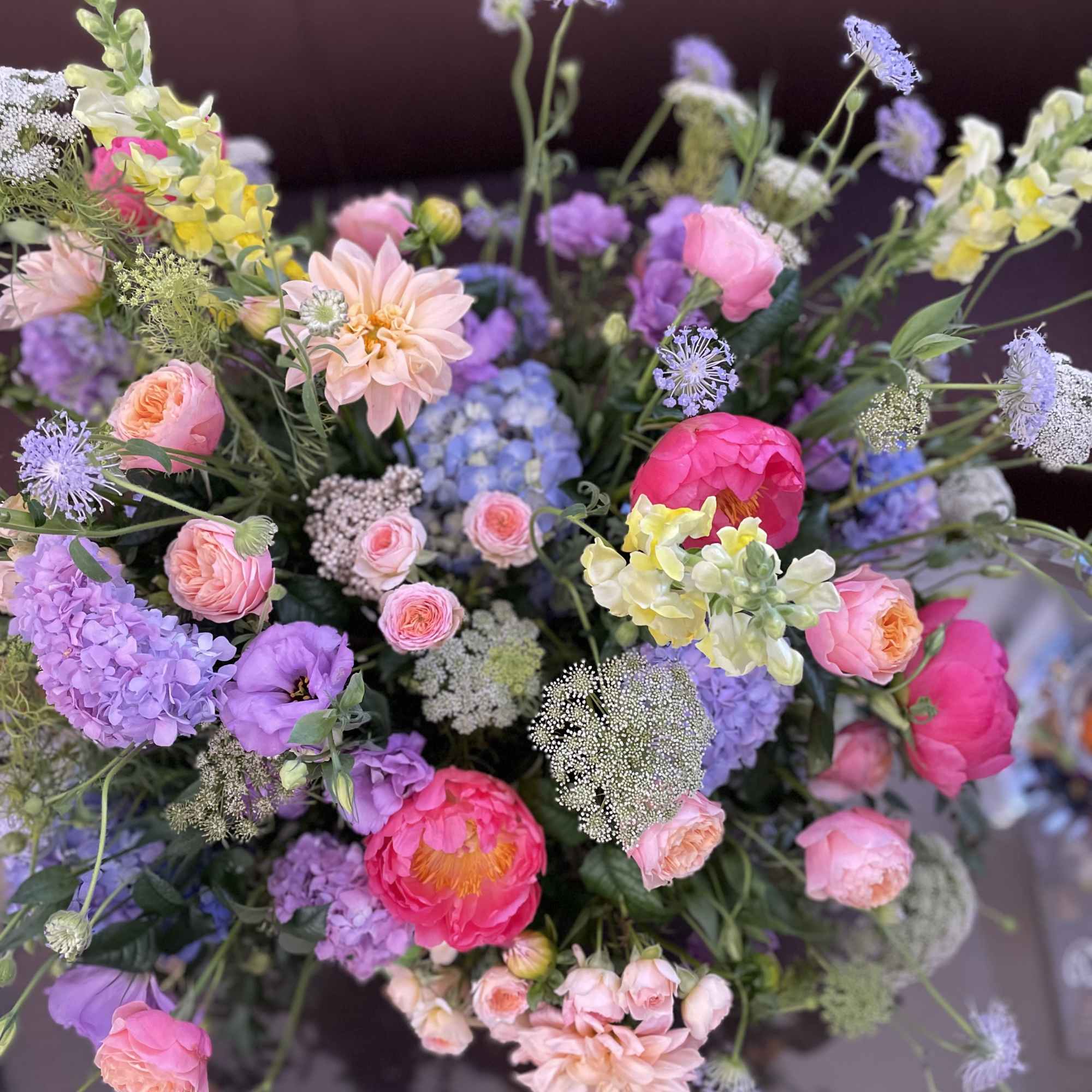 Mixed bouquet of pink, purple, and yellow flowers