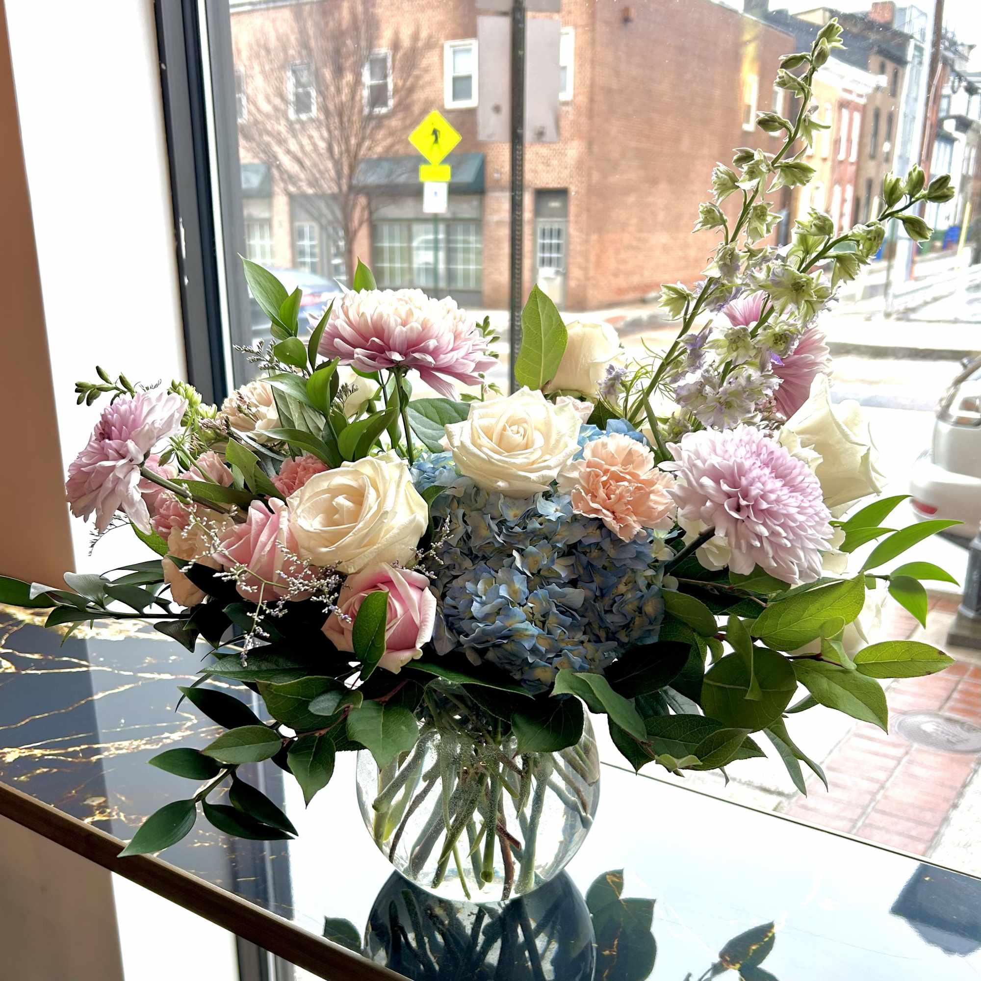 Bouquet of pink and white flowers in a glass vase