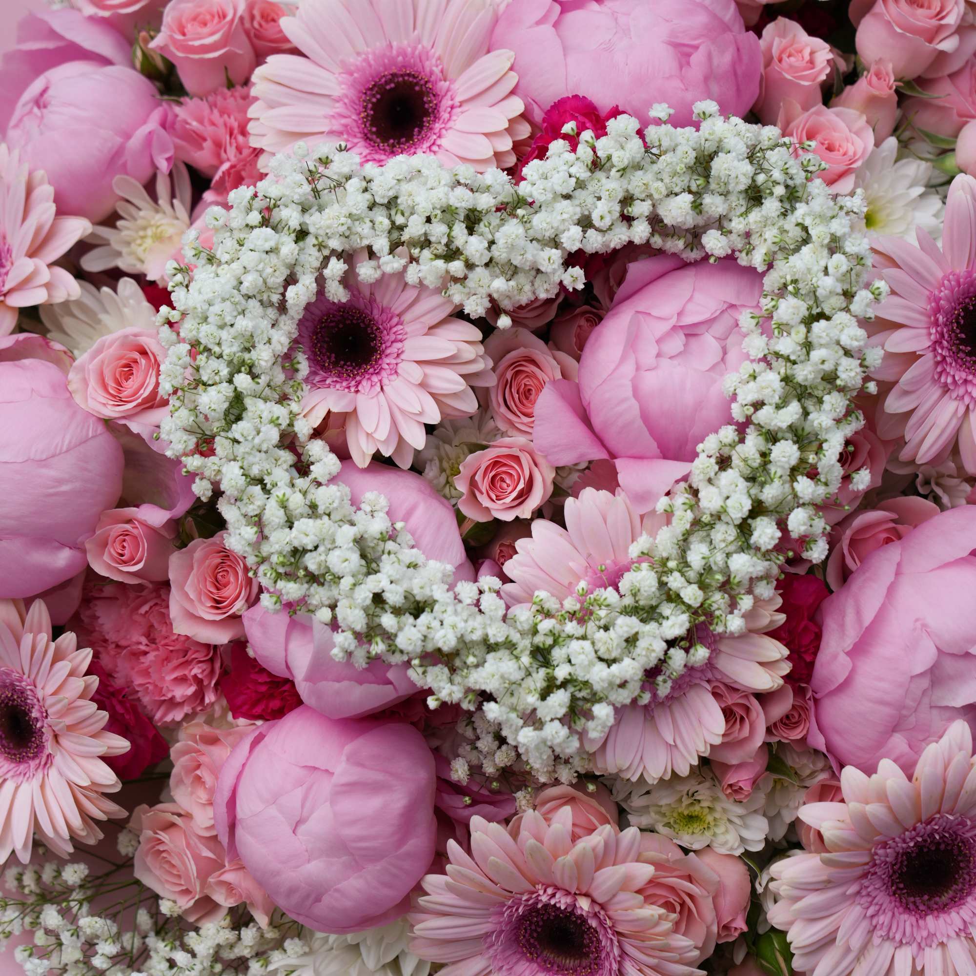 Pink bouquet with roses, peonies, and gerbera daisies
