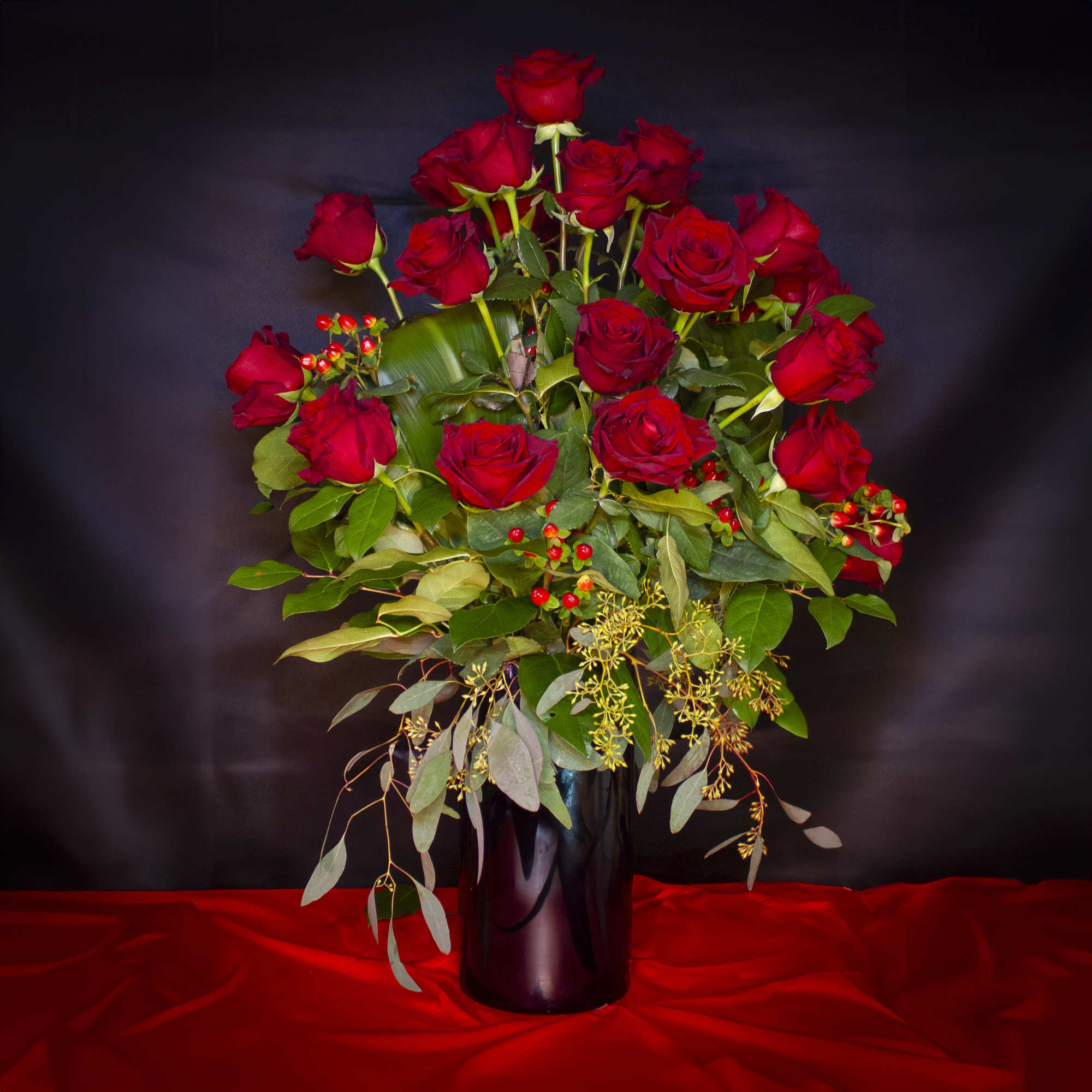 2 Dozen Deep Red Explorer Roses, thoughtfully arranged in a glossy black, photo 2 of 2