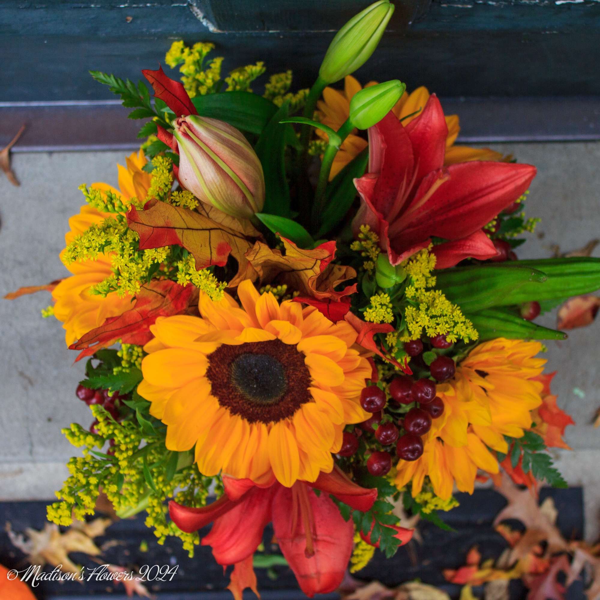 Autumn bouquet with sunflowers, red lilies, and berries, photo 3 of 5