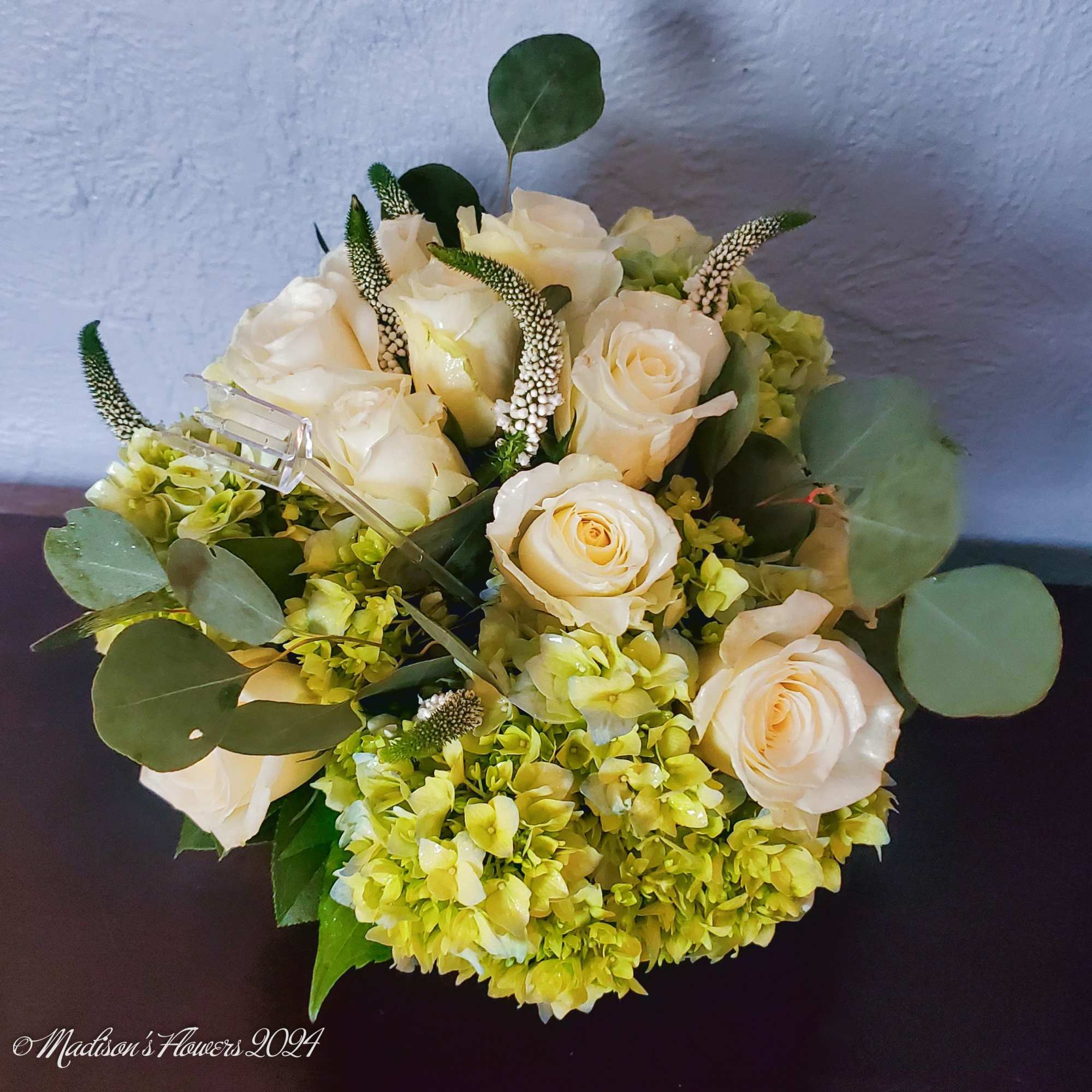 Classic round table-top arrangement featuring cream colored roses, accent flowers in soft, photo 3 of 4