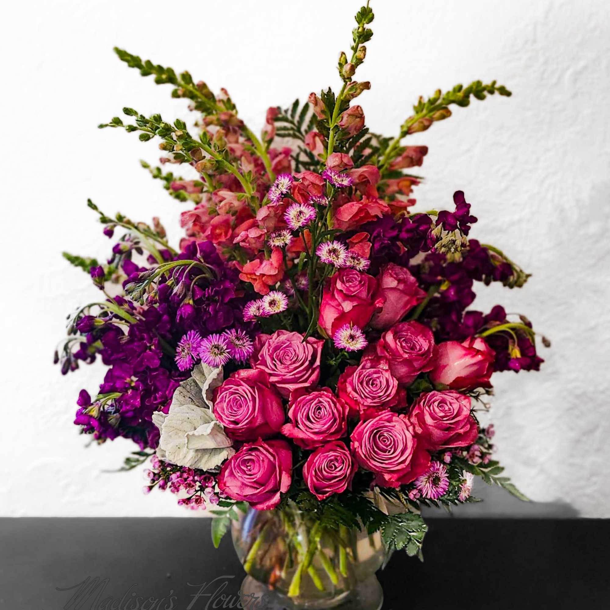 For the special individual that loves Purple. This specially designed arrangement combines