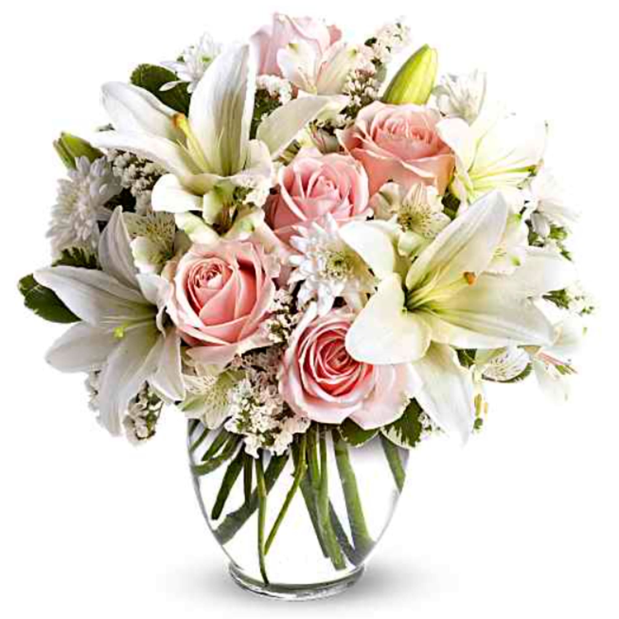 Pink roses and white lilies arranged in a clear glass vase