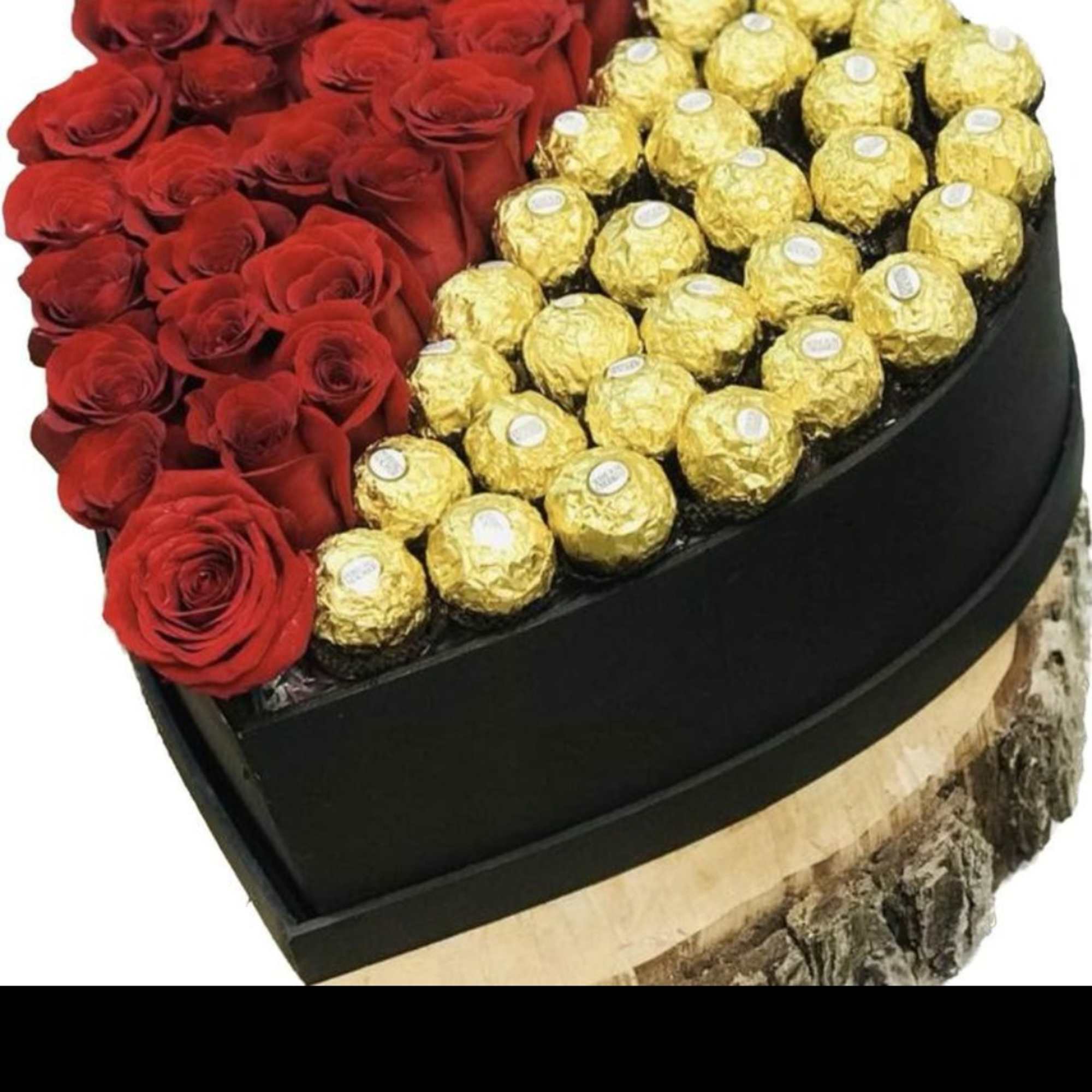 Heart-shaped box with red roses and gold-wrapped chocolates