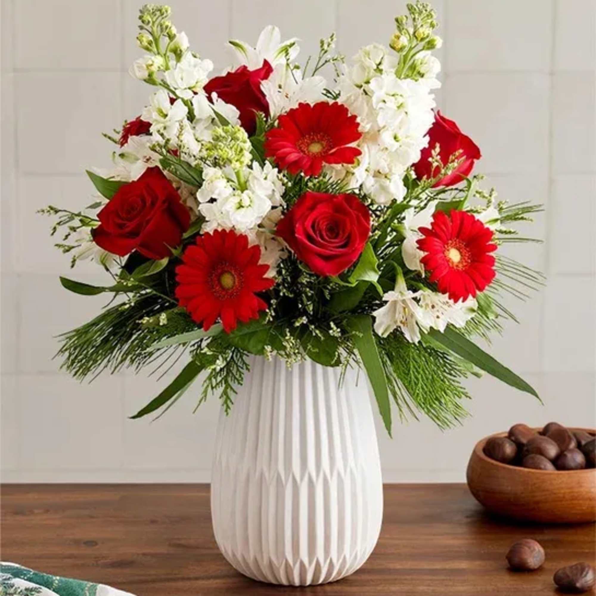 Celebrate the most magical time of year with our dazzling bouquet. A
