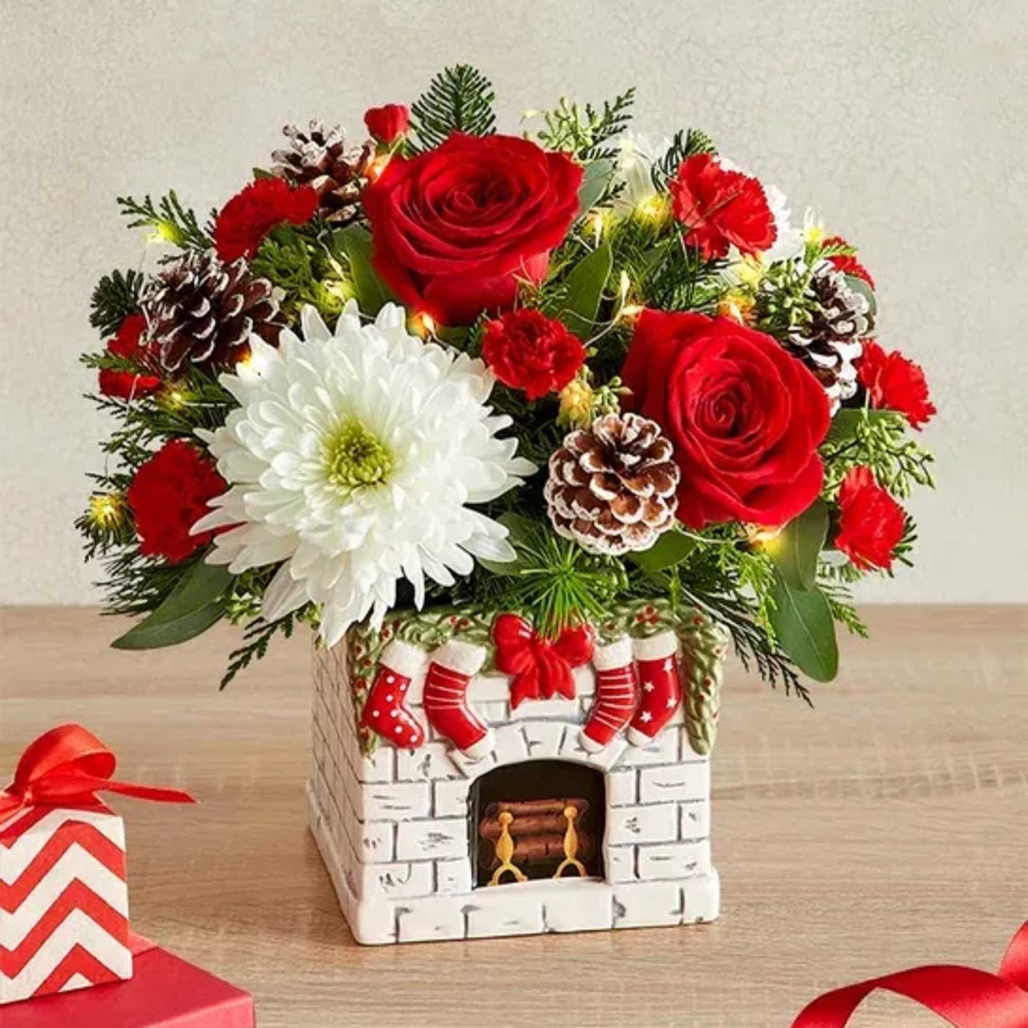 Cozy up to the fireplace with this charming red and white Christmas