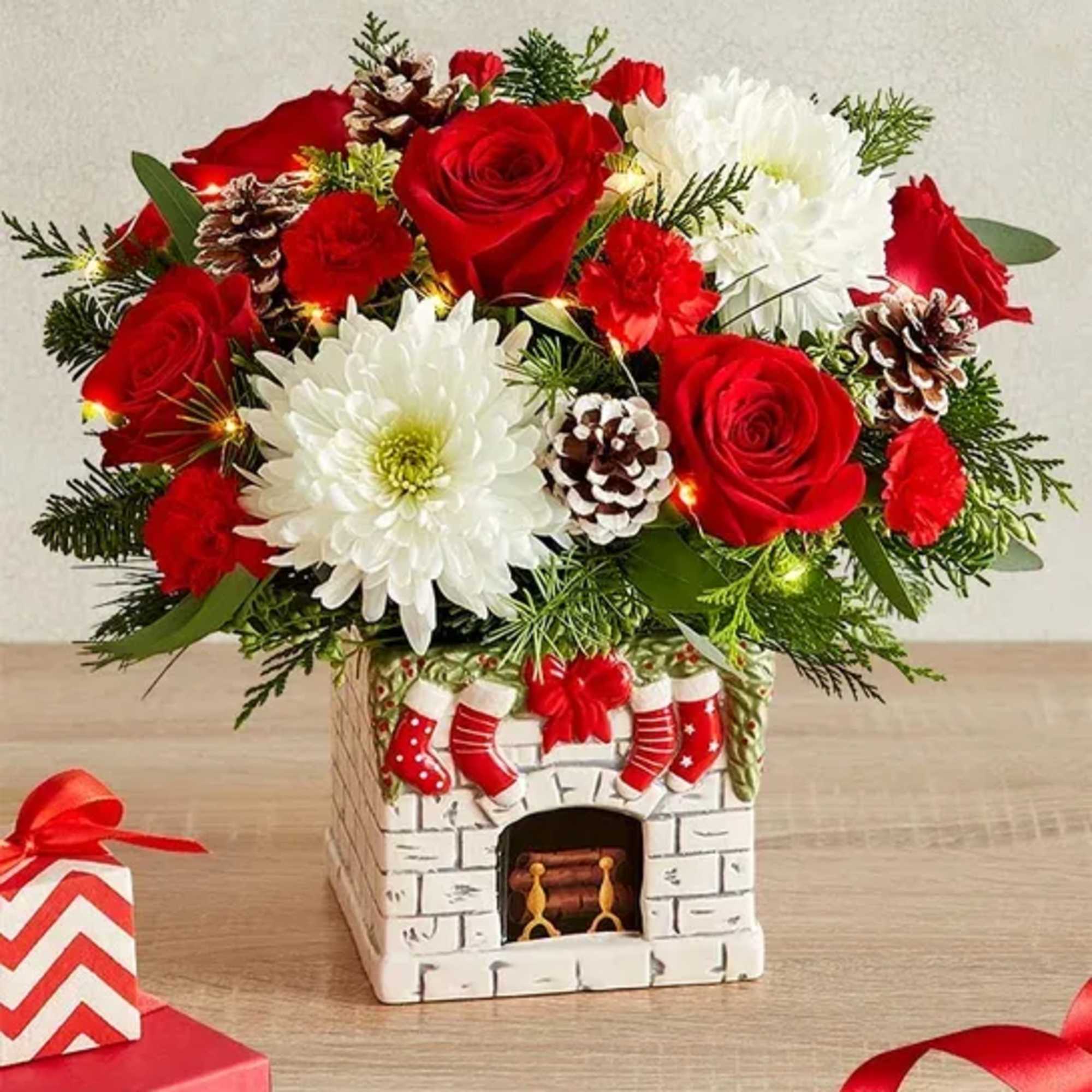Cozy up to the fireplace with this charming red and white Christmas