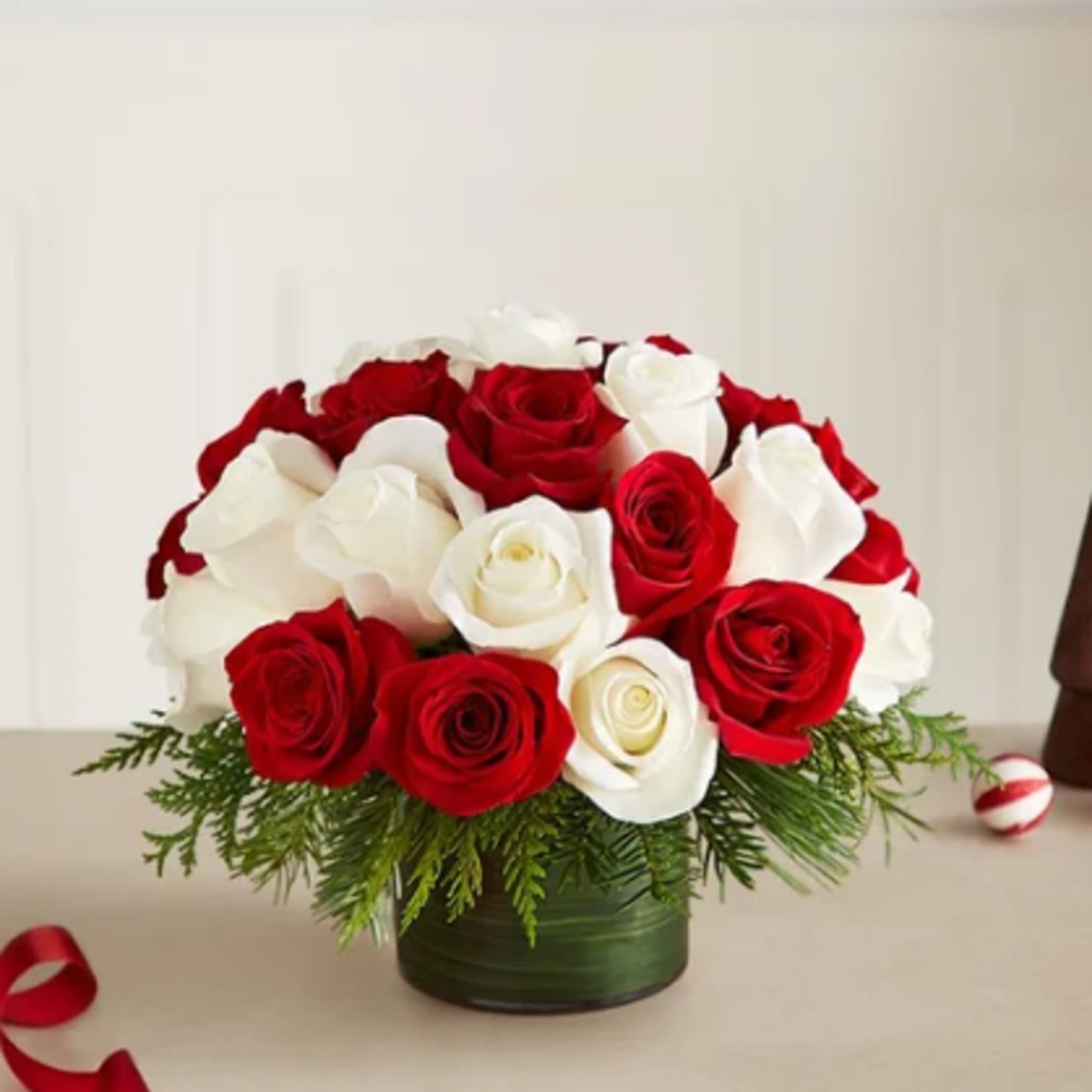 Classic Christmas with a fun, modern twist! Our red and white roses