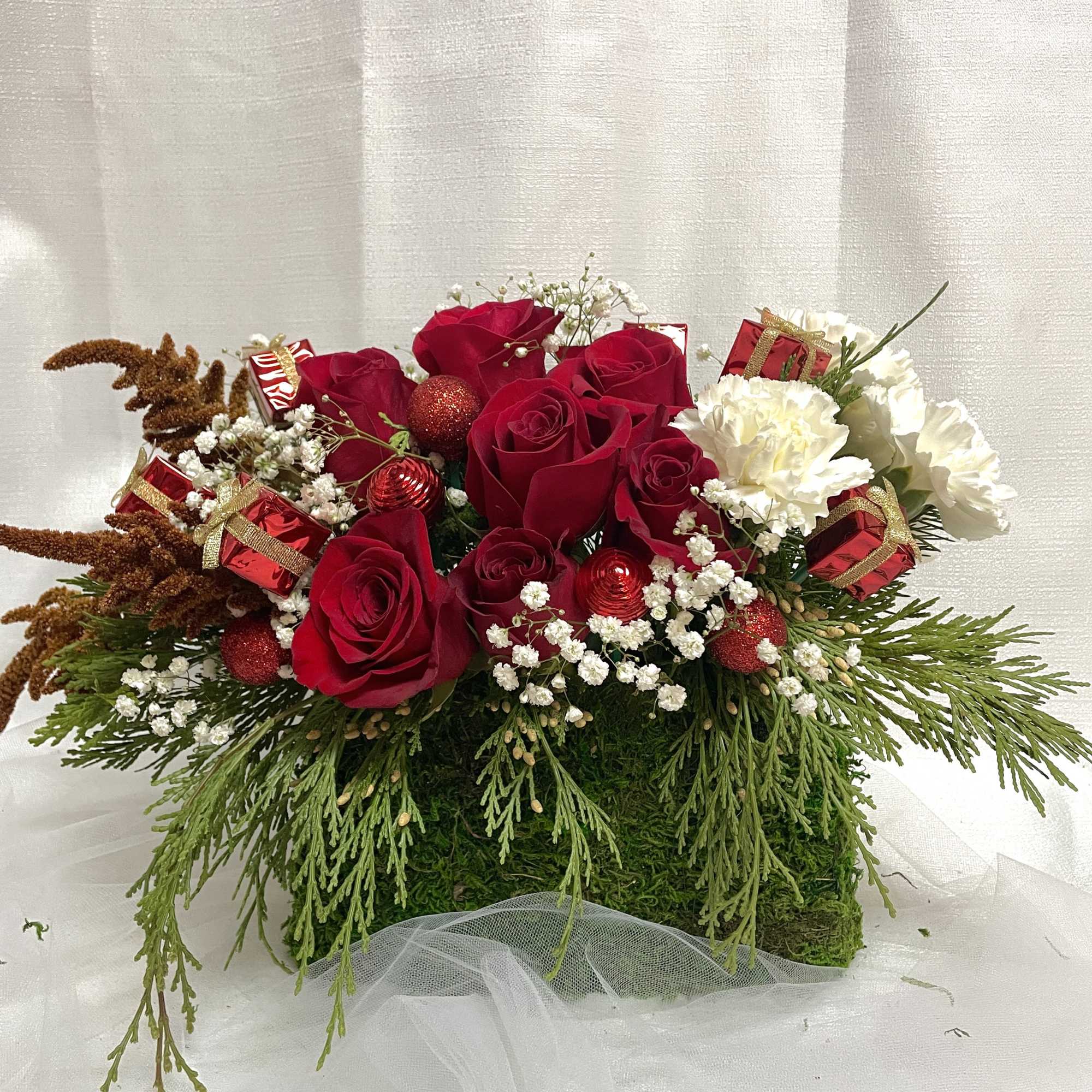 An enchanting holiday arrangement set in a lovely green moss purse (with, photo 2 of 2