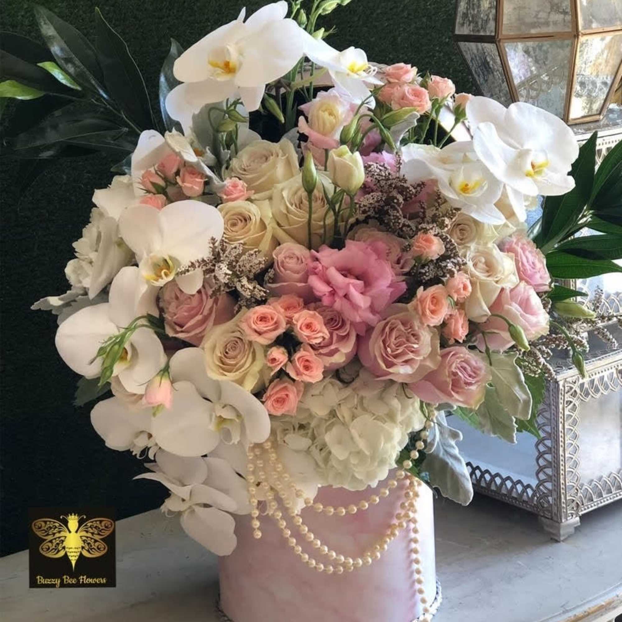 This beautiful arrangement called The Marilyn Monroe is designed to deliver happiness