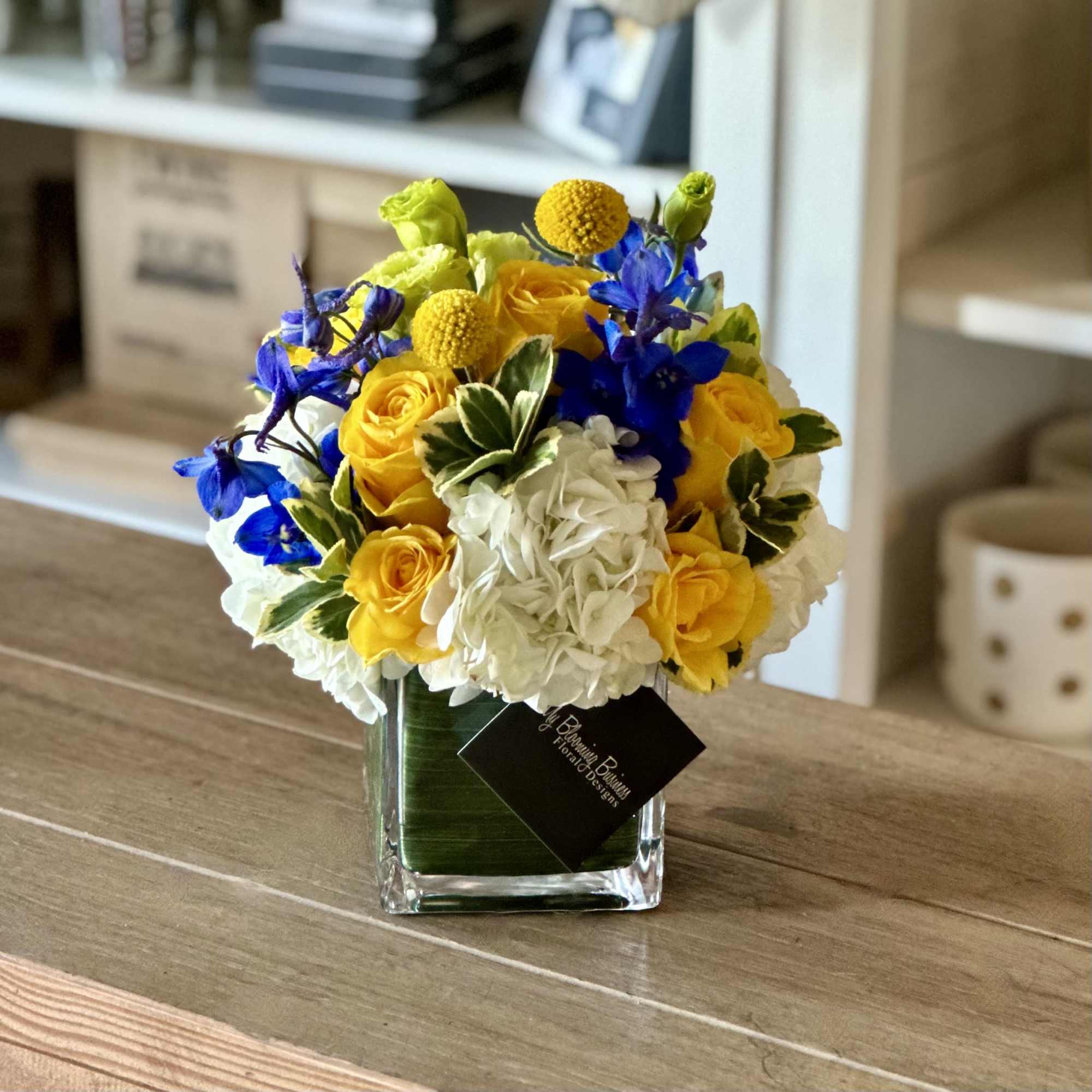 4X4 glass cube arrangement.  Our bluebell arrangement is a mix of, photo 2 of 3