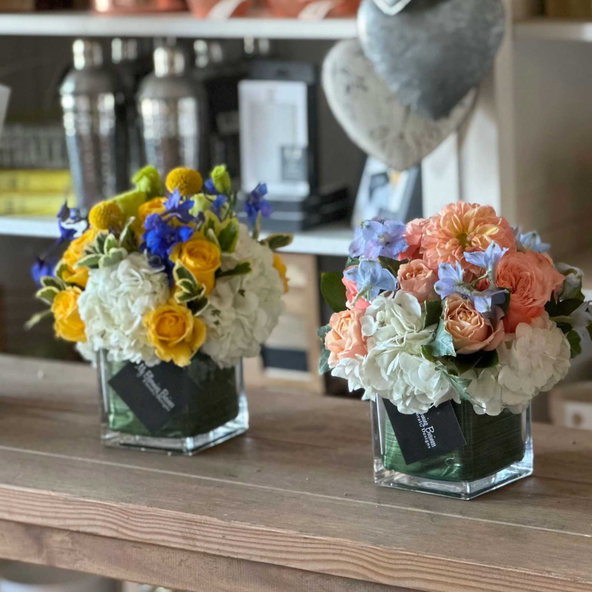 4X4 glass cube arrangement.  Our bluebell arrangement is a mix of, photo 3 of 3