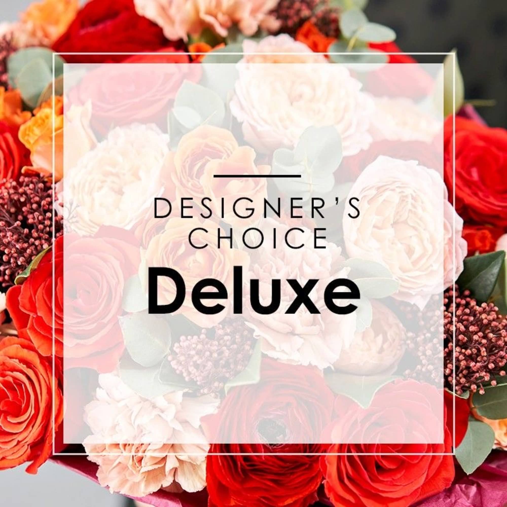 A stunning variety of in season, in stock flowers designed with a