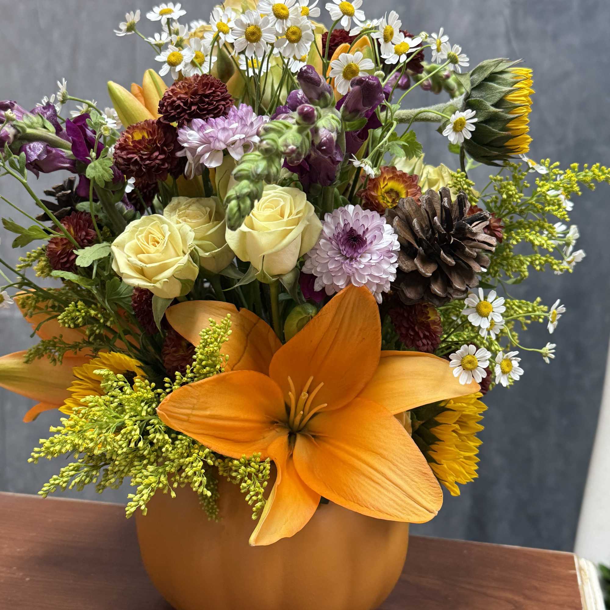 Bring fall into your home with this vibrant pumpkin arrangement filled with, photo 2 of 2