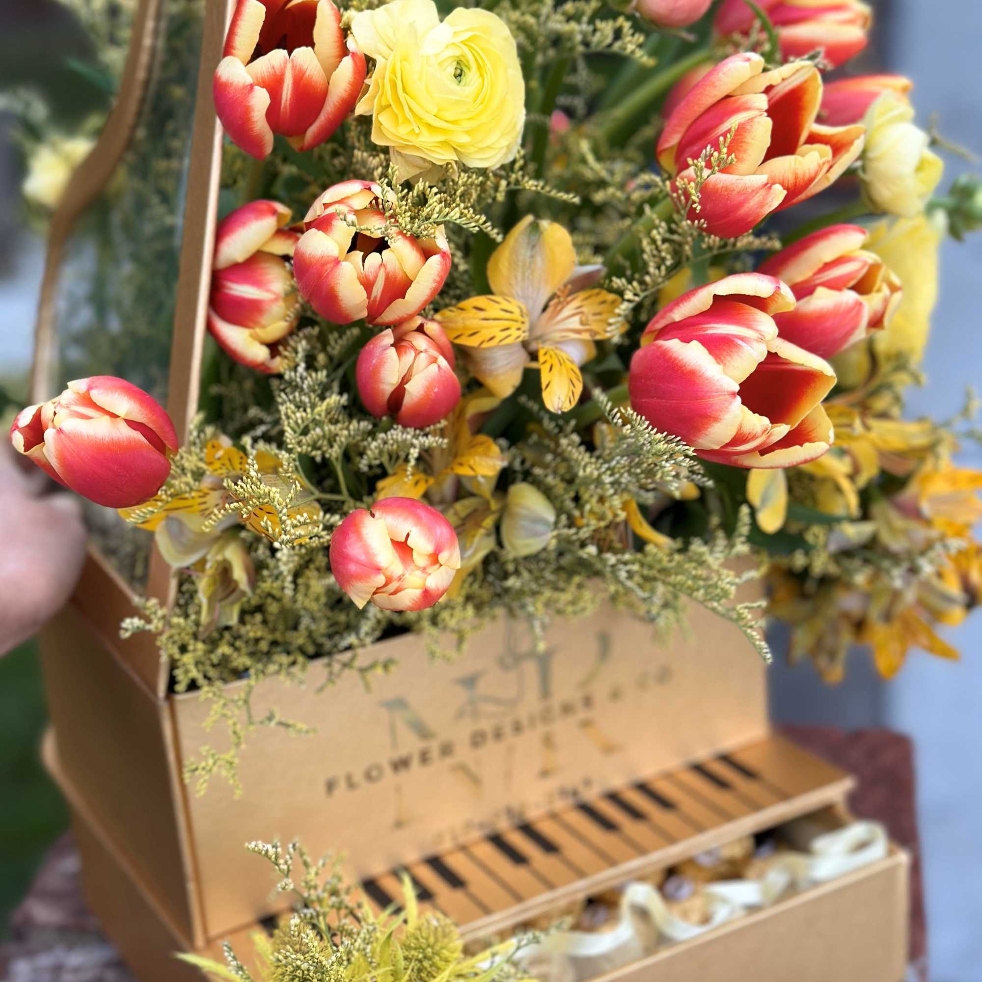 Bright and Elegant combination of Tulips, Ranunculus, and Iris flowers are put, photo 2 of 2
