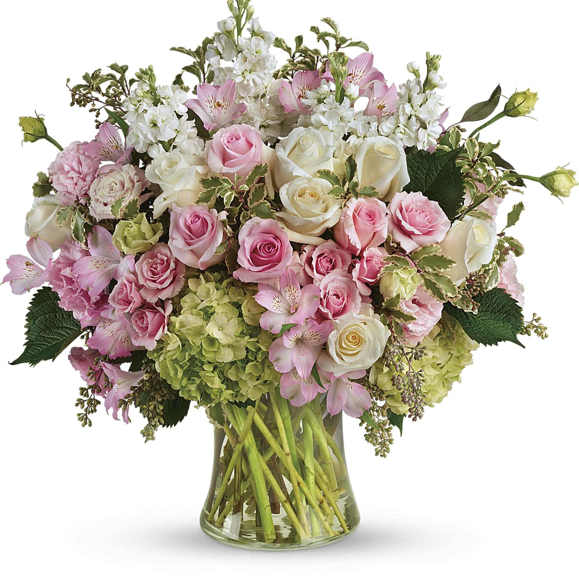 Pink and white roses with alstroemeria in a glass vase