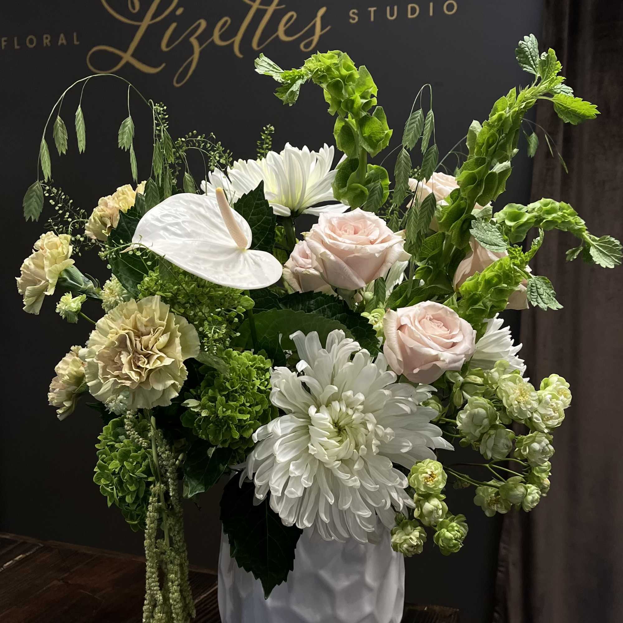 Elevate any space or occasion with our Neutrals Designer&rsquo;s Choice flower arrangement