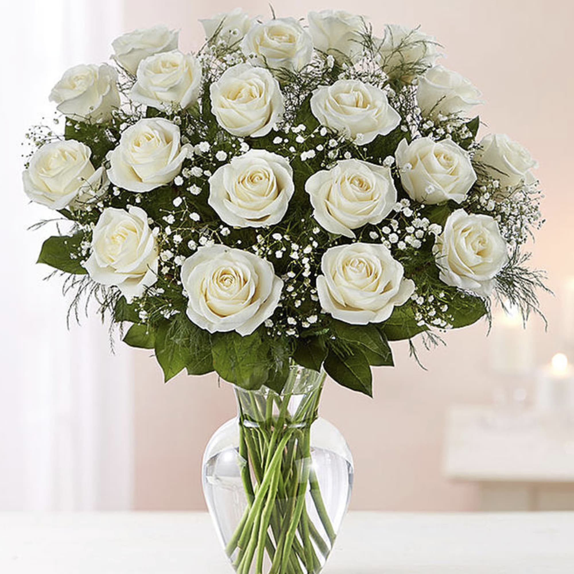 A dozen white roses are a classic gift! Perfect for any expression