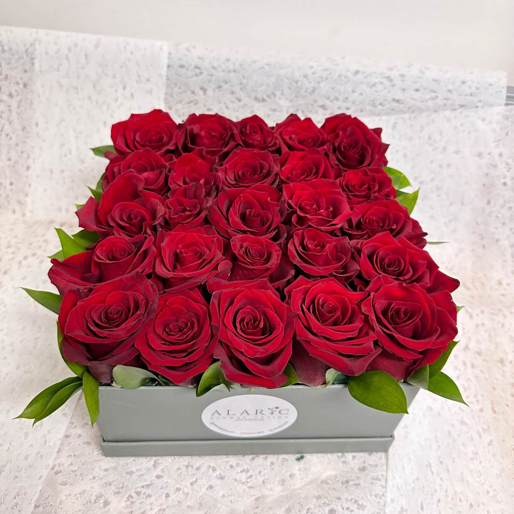 A simple square box filled with red roses!

Note: The color of the, photo 2 of 2
