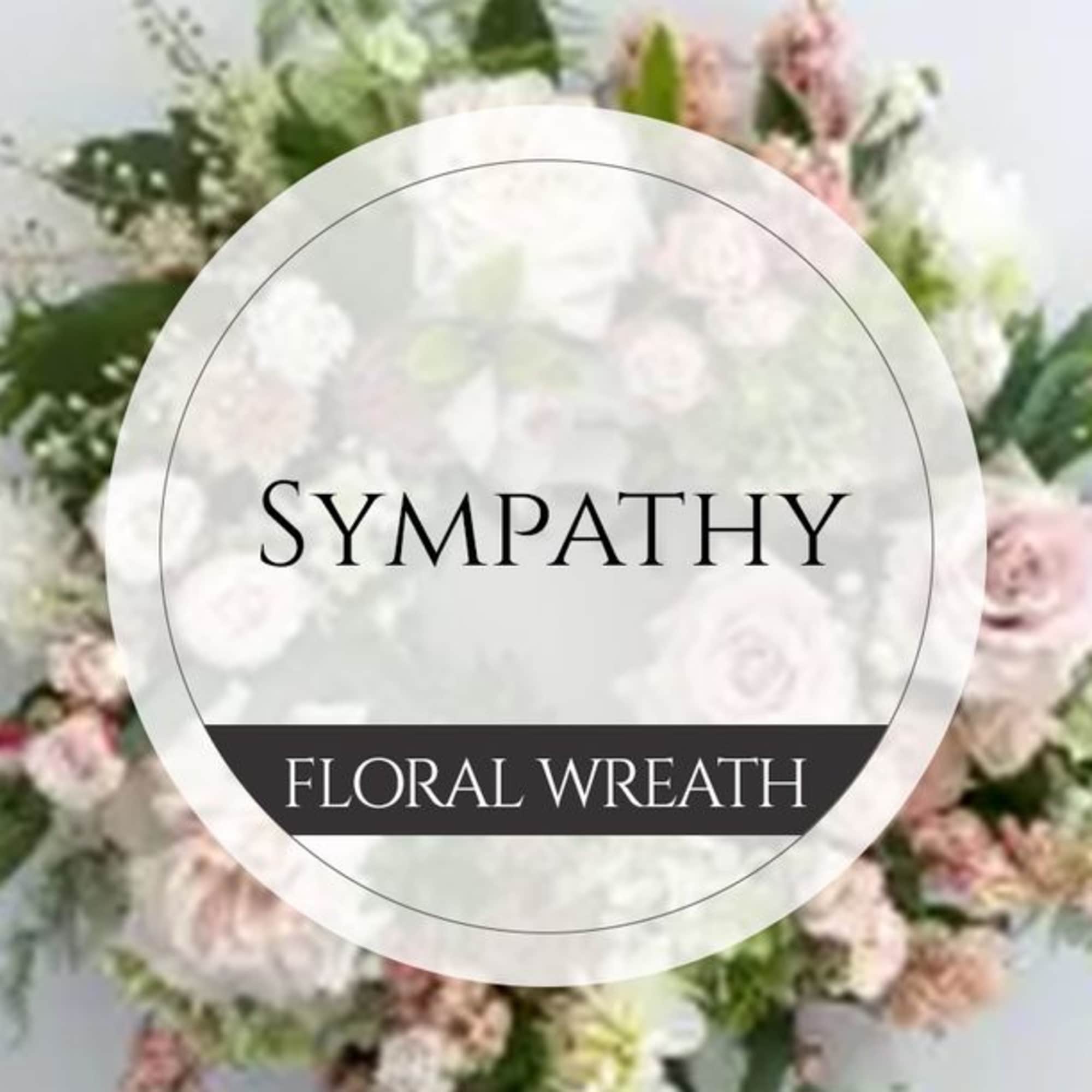 Sympathy floral wreath with pale pink and white flowers