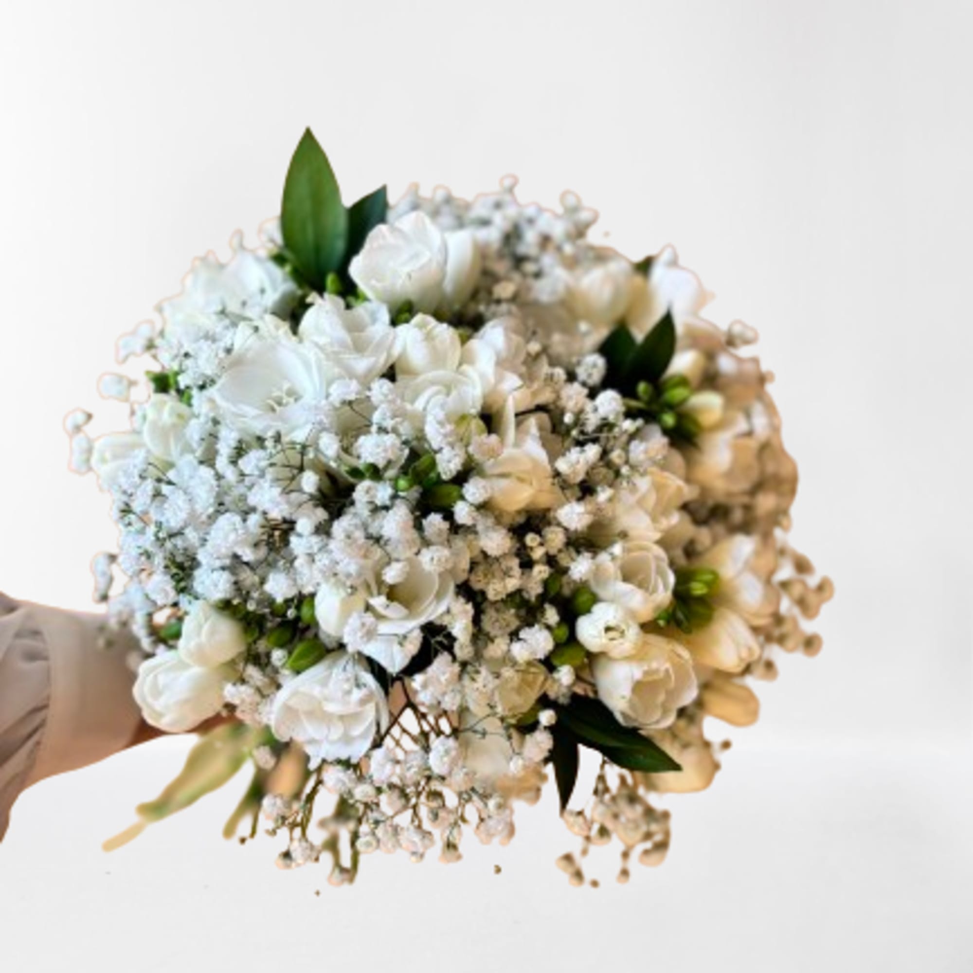 White bouquet with baby's breath and green accents