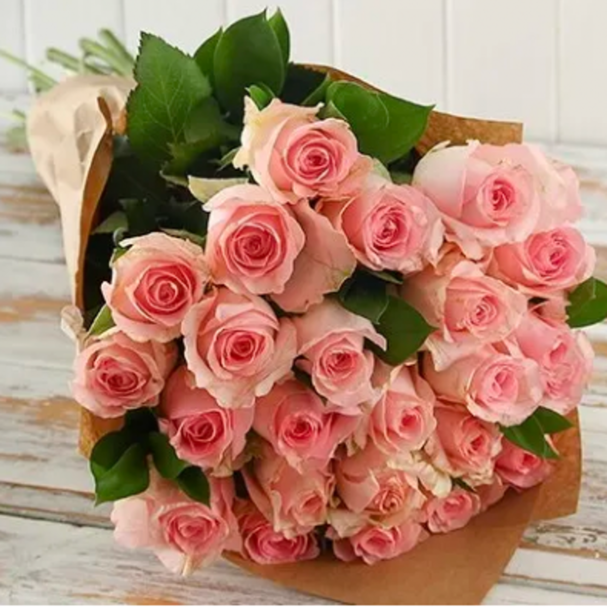 Spread the love with our Wrapped Red or Pink Rose Bouquet! 