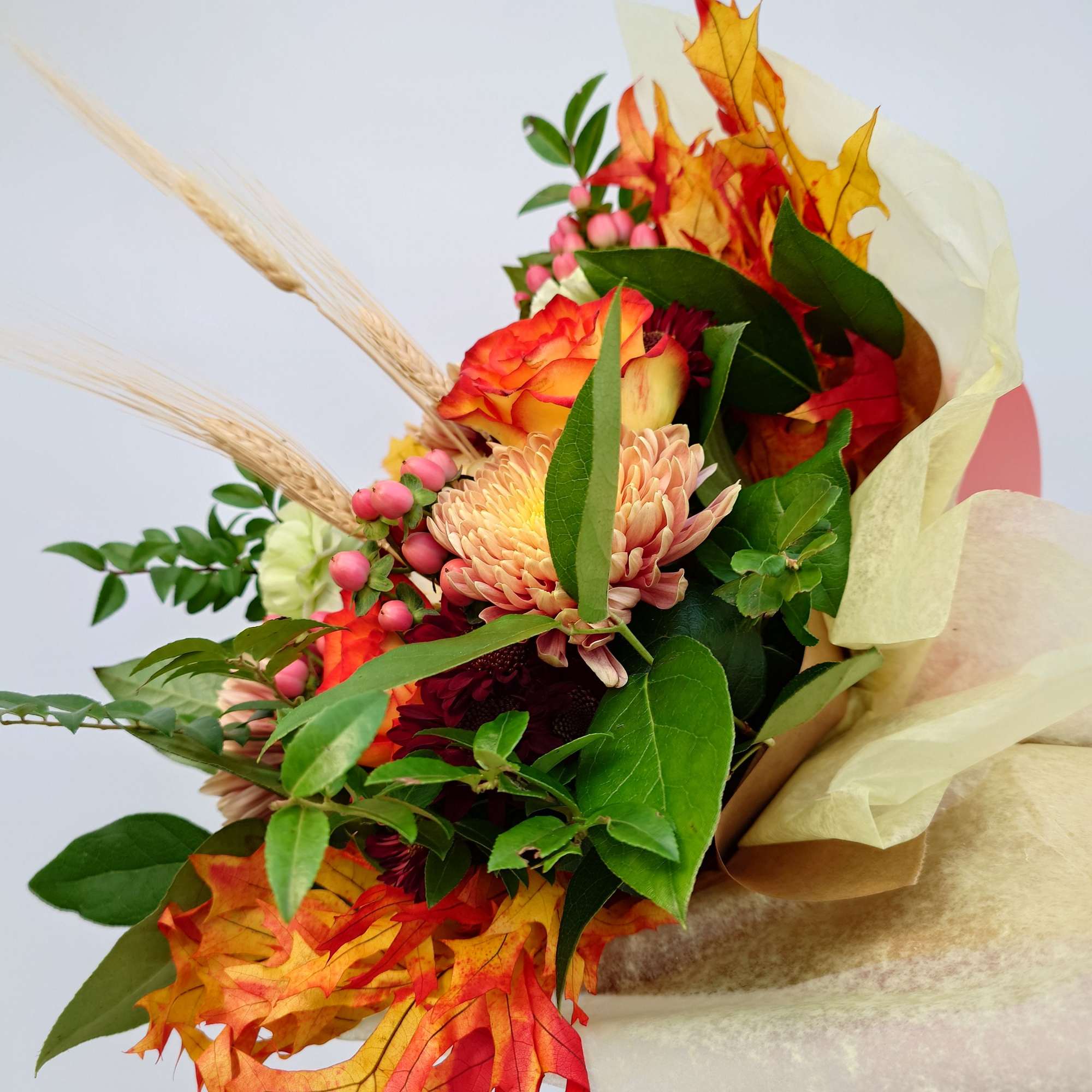 A stunning collection of autumn flowers, thoughtfully arranged for you to showcase