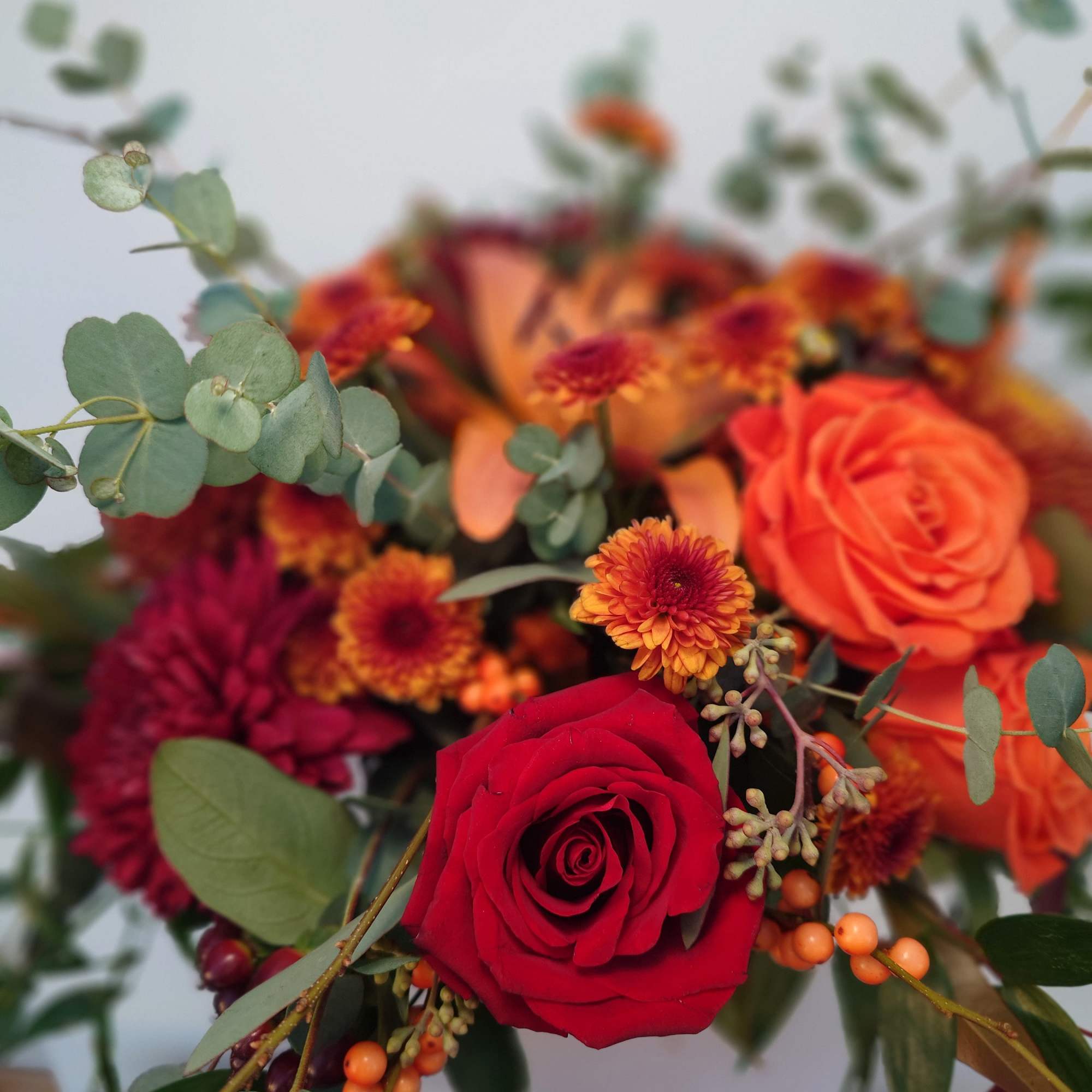 Capture the cascading beauty of Cascadilla Falls with our "Cascadilla Cornucopia" centerpiece