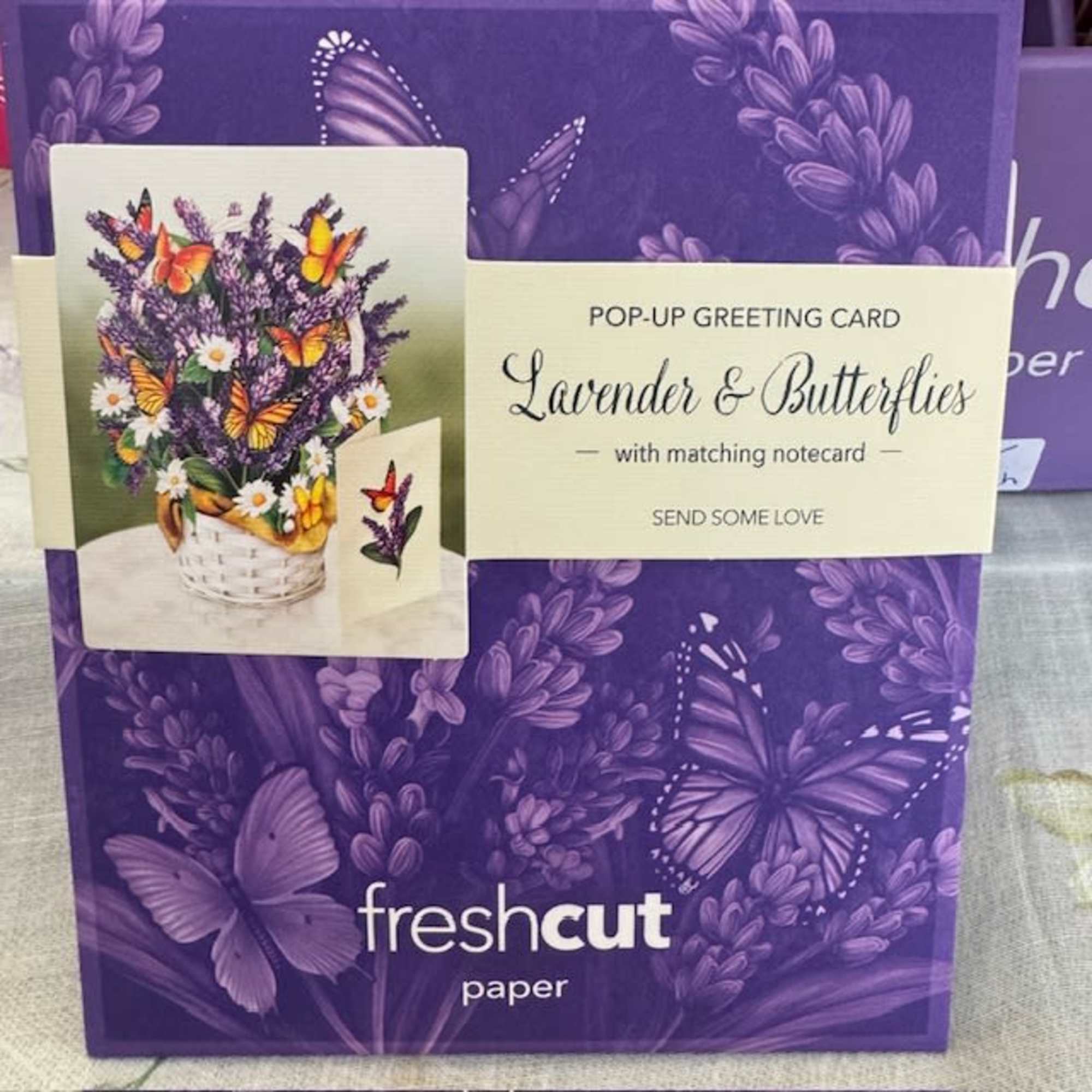 Purple pop-up greeting card with butterflies and a lavender bouquet illustration