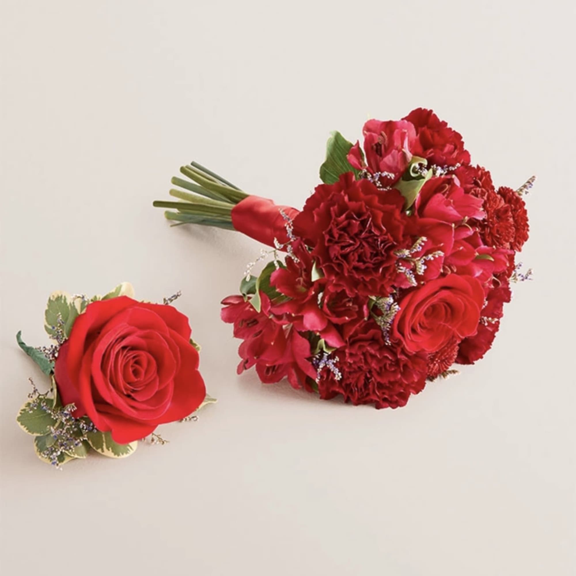 A beautifully coordinated bouquet and boutonniere set designed to complement each other