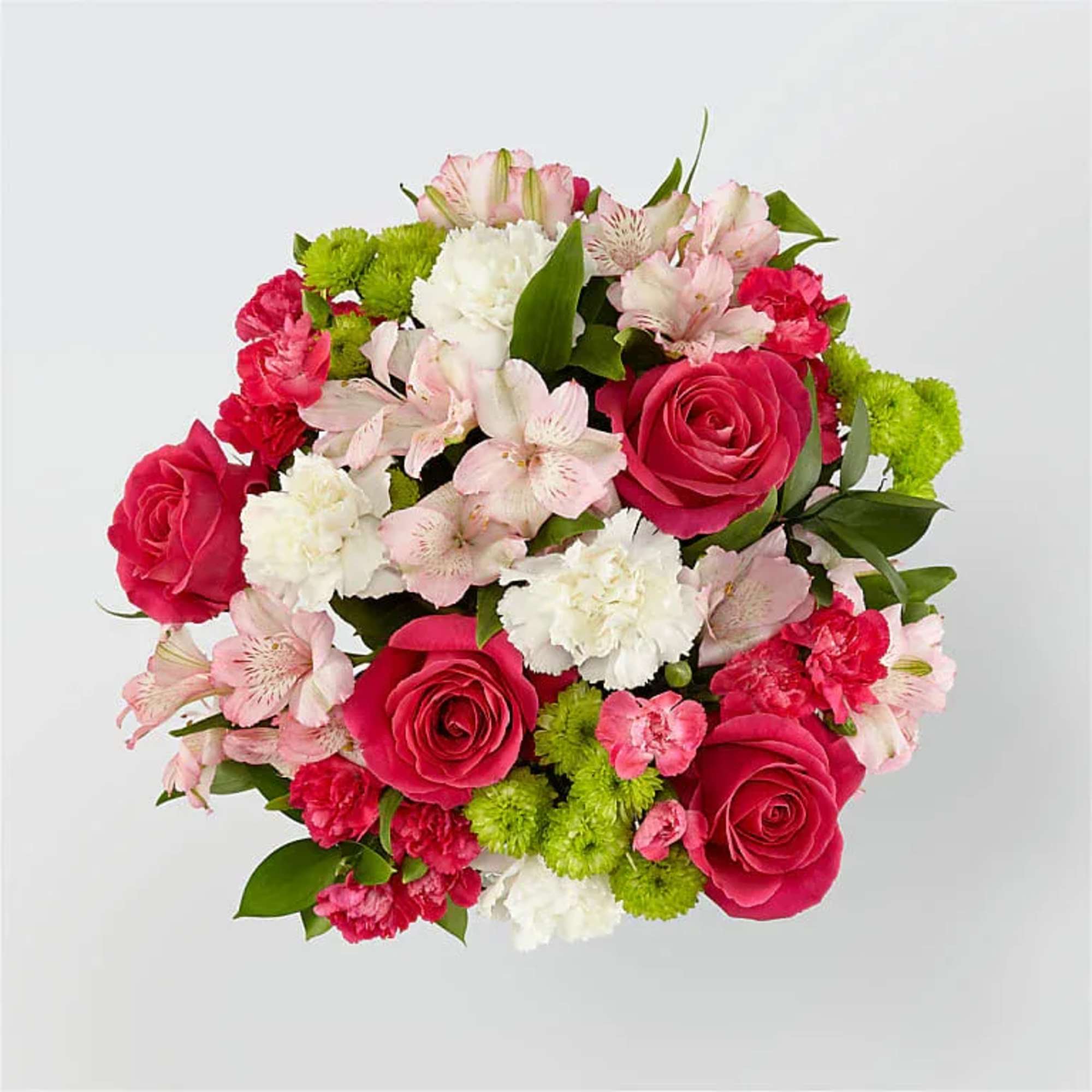 Round bouquet of hot pink roses, white carnations, pink alstroemeria and green button mums.