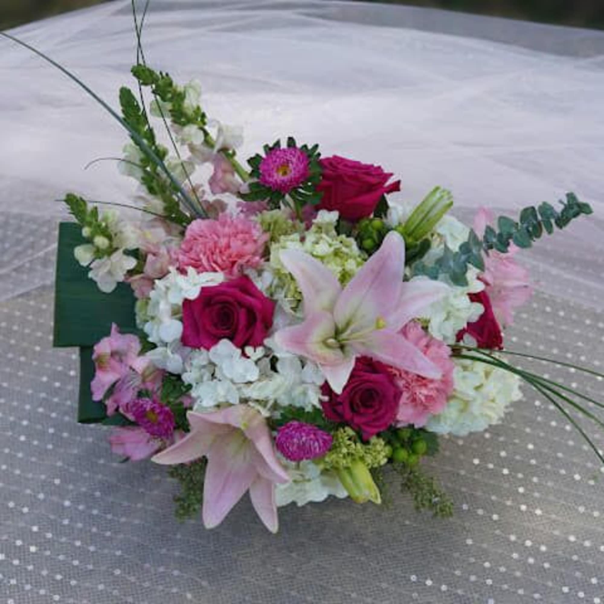Pink and white mixed bouquet with lilies and roses
