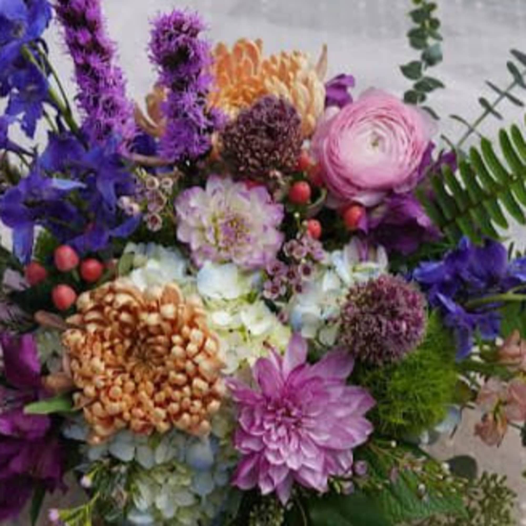Mixed bouquet with purple, pink, and white flowers