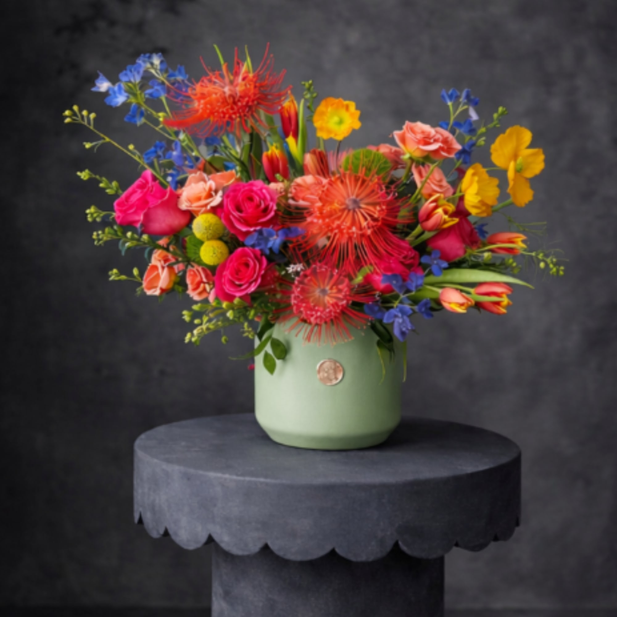 A bold and vibrant arrangement designed with bright, eye-catching colors and rich, photo 2 of 2
