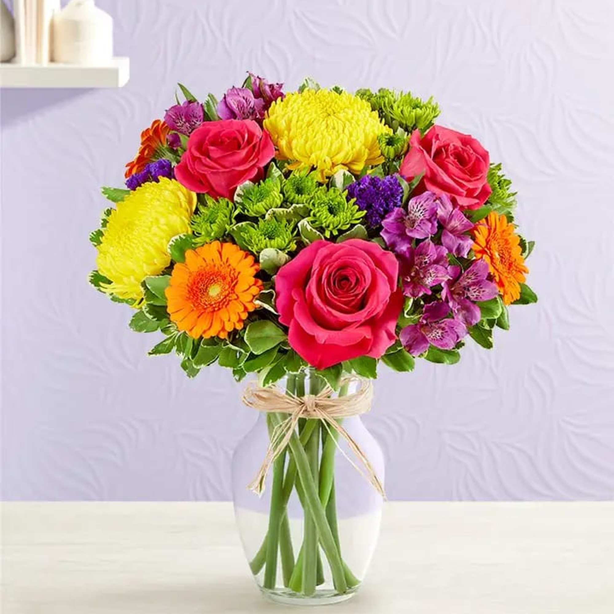 Bright, happy blooms for every day worth celebrating! Our new arrangement is